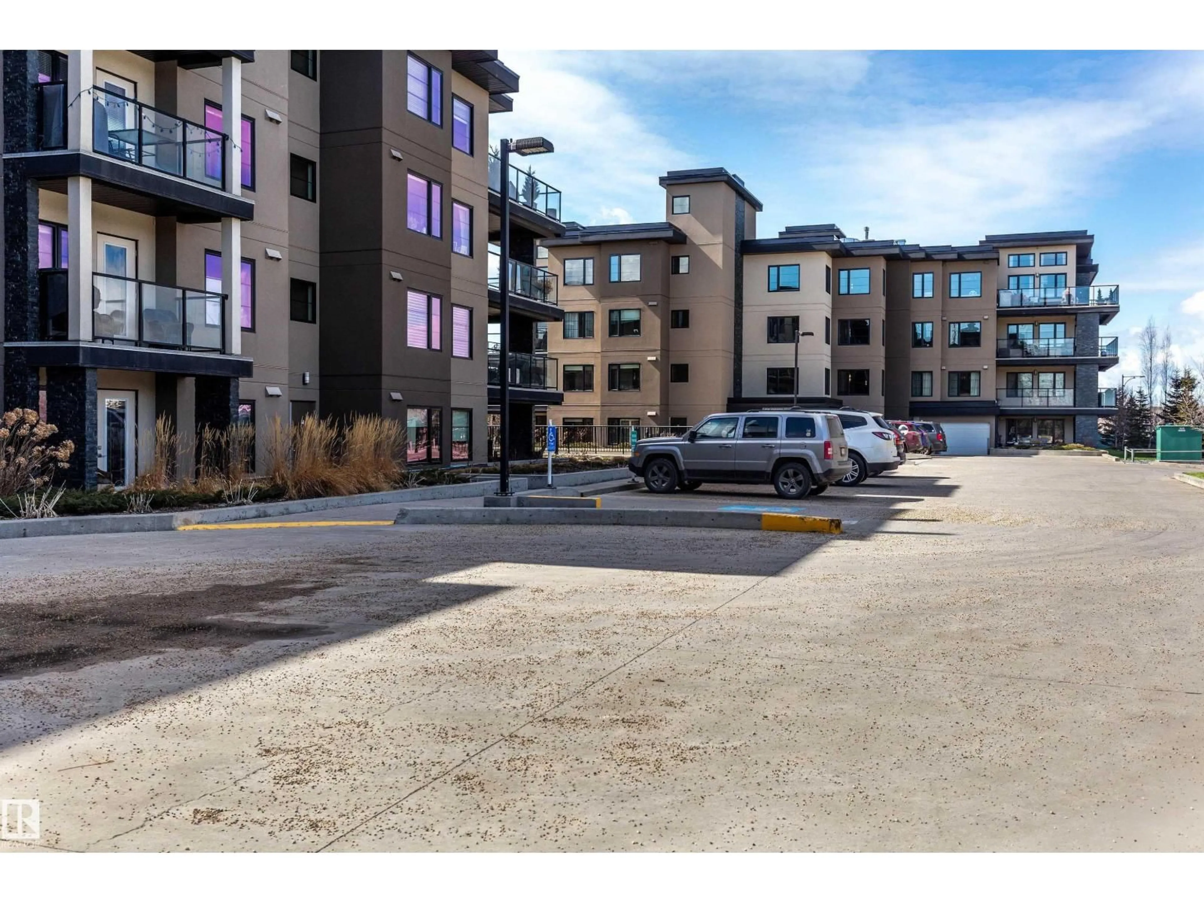 A pic from outside/outdoor area/front of a property/back of a property/a pic from drone, street for #108 - 5025 EDGEMONT BV, Edmonton Alberta T6M0S8