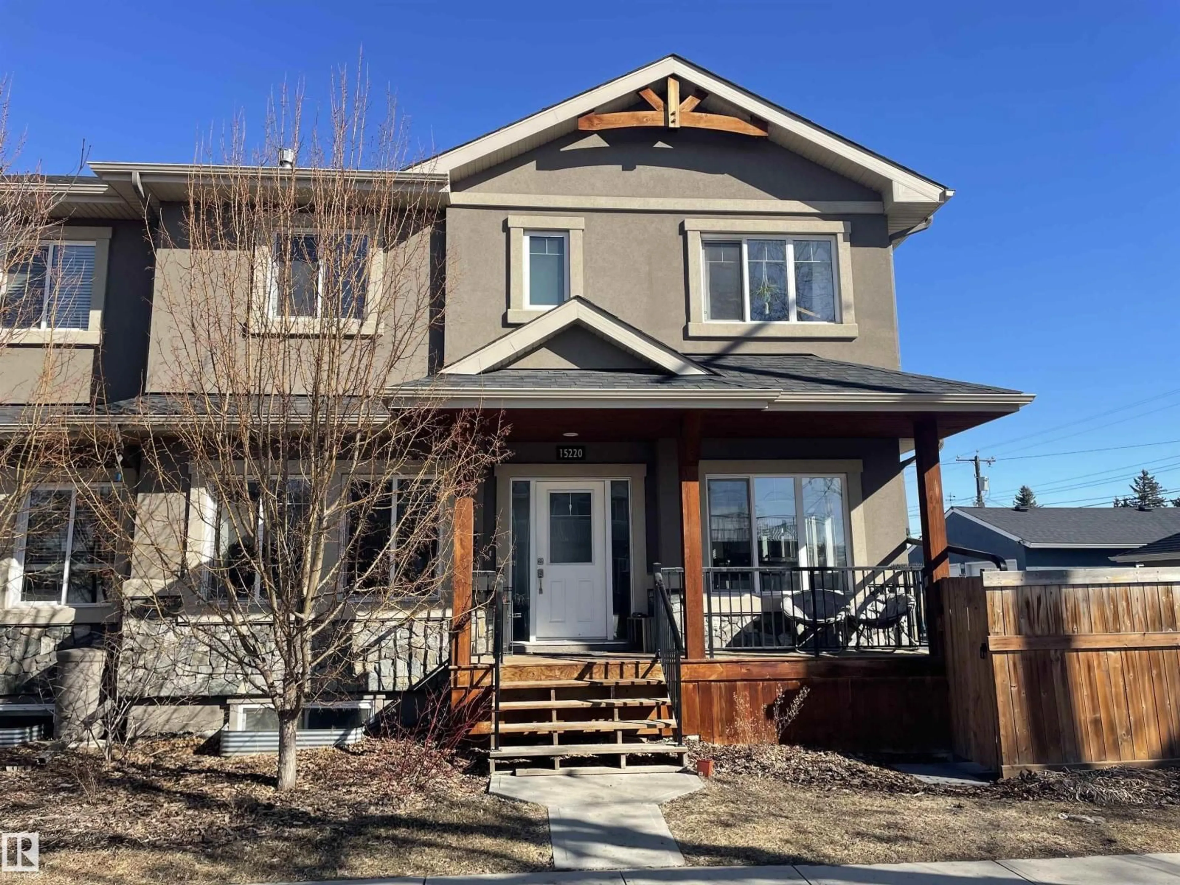 Home with vinyl exterior material, street for 15220 105 AV, Edmonton Alberta T5P4J9