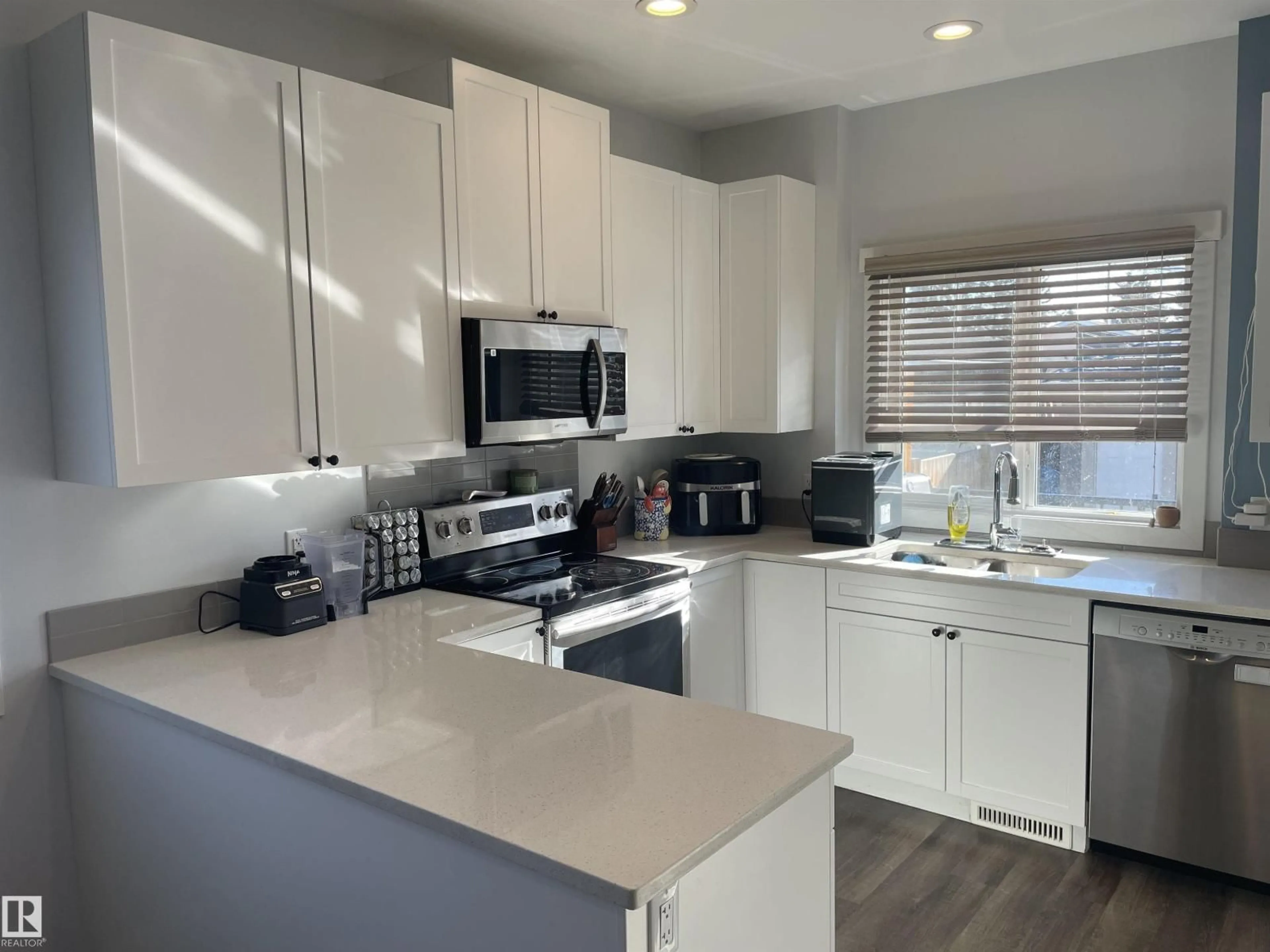 Open concept kitchen, unknown for 15220 105 AV, Edmonton Alberta T5P4J9