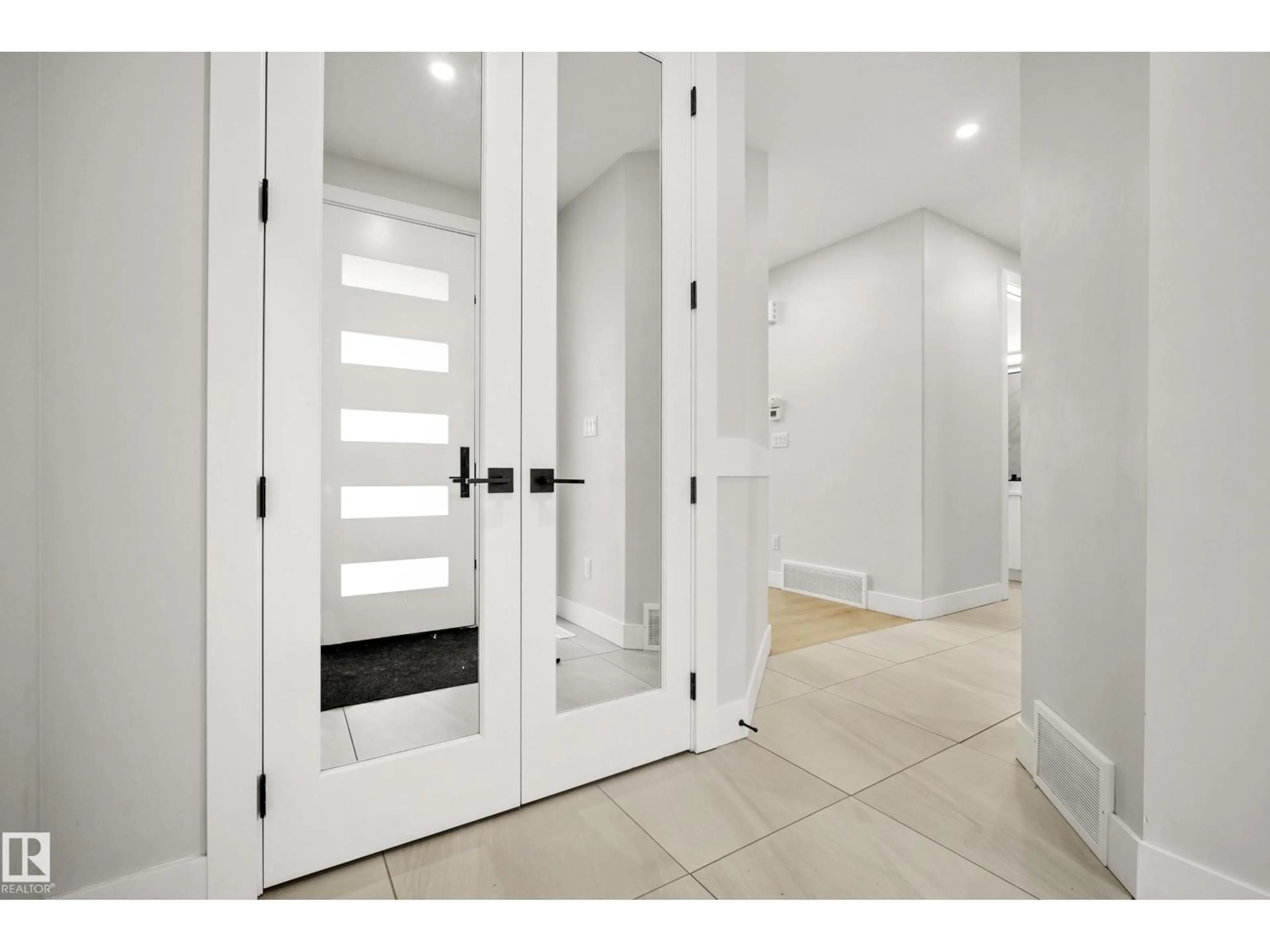 Indoor entryway for NW - 15031 10 ST, Edmonton Alberta T5Y4C8