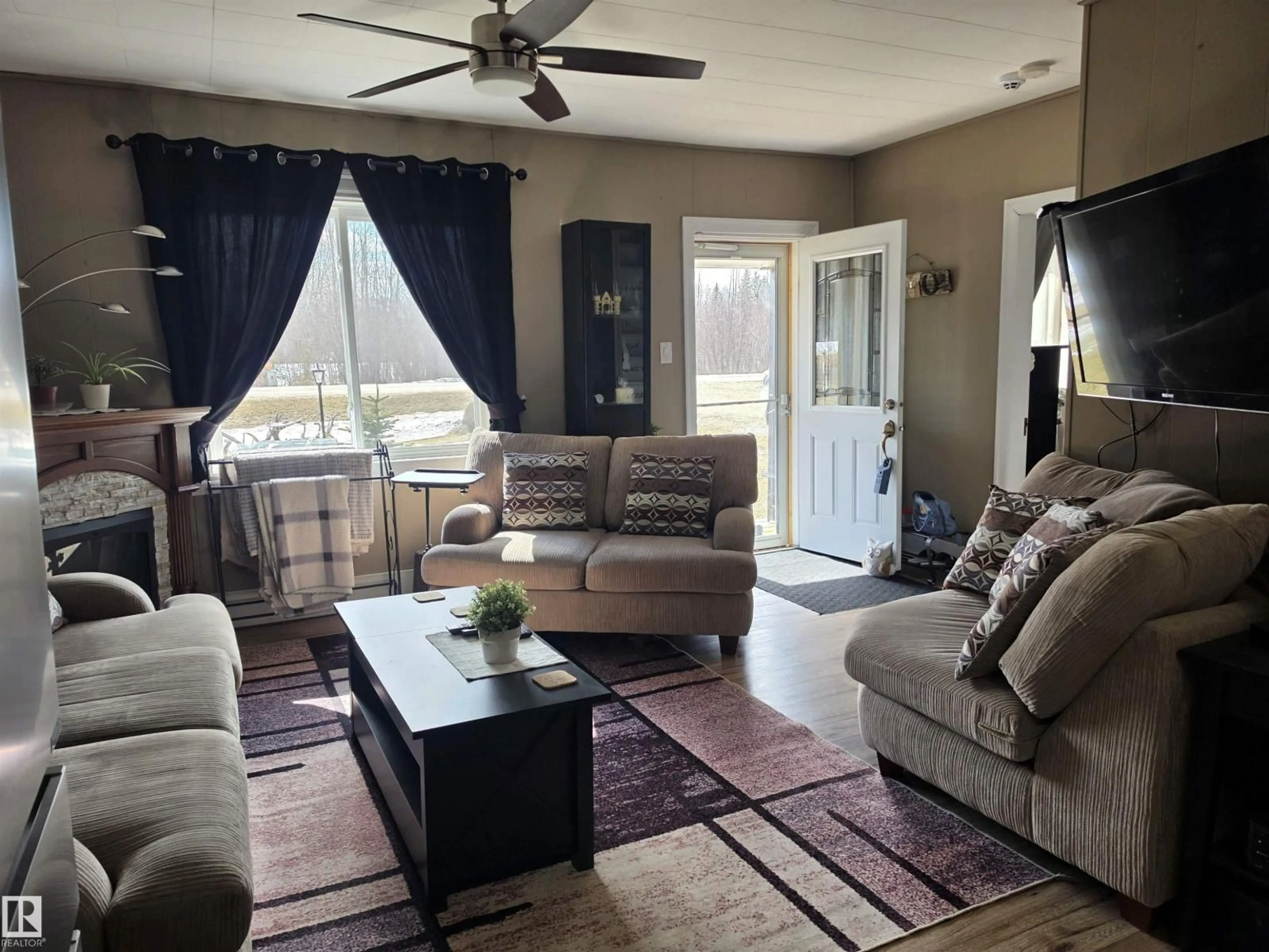 Living room with furniture, unknown for 202 - 56102 RGE ROAD 53, Cherhill Alberta T0E0J0