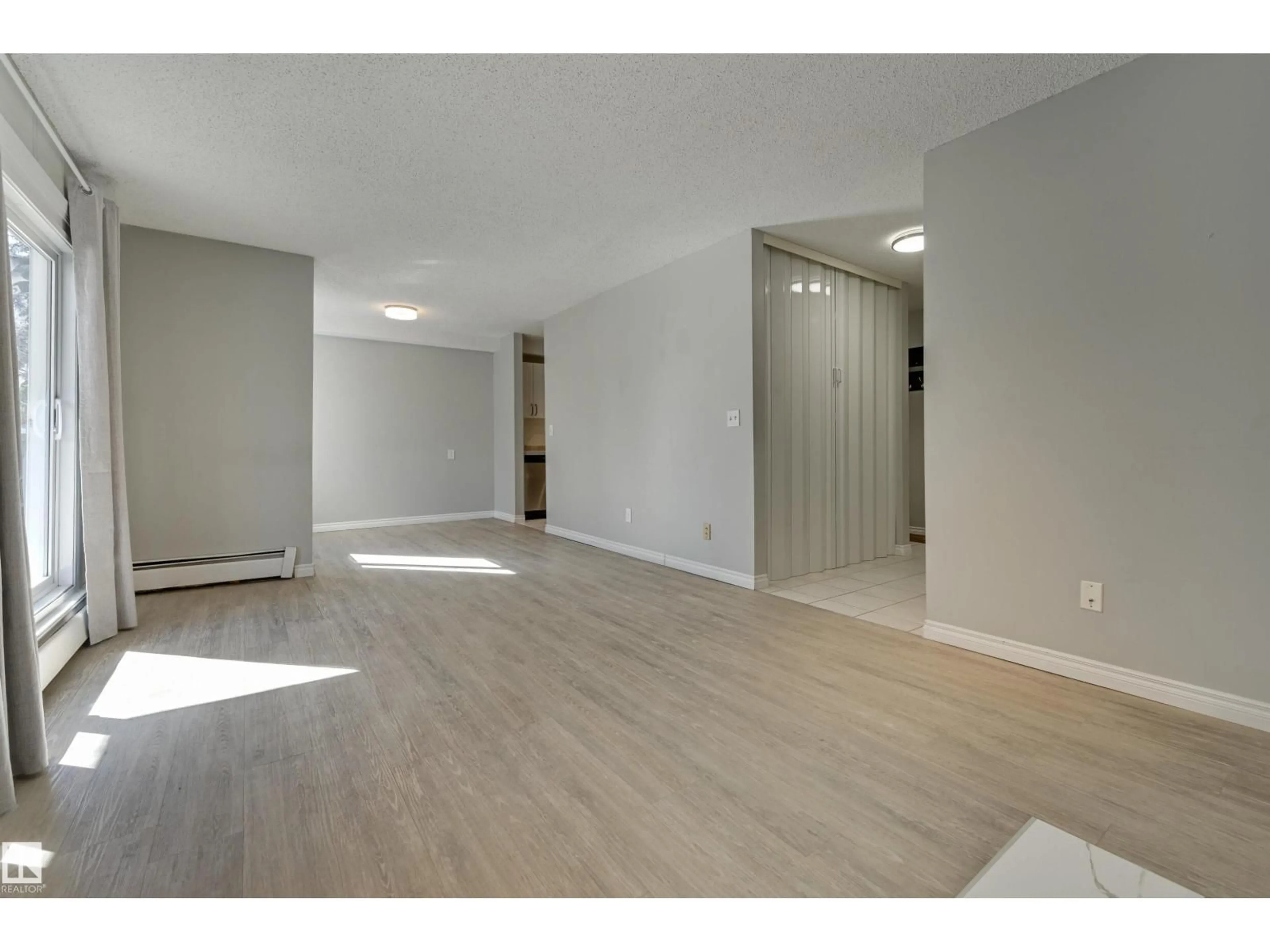 A pic of a room for #113 - 10838 108 ST, Edmonton Alberta T5H3A6