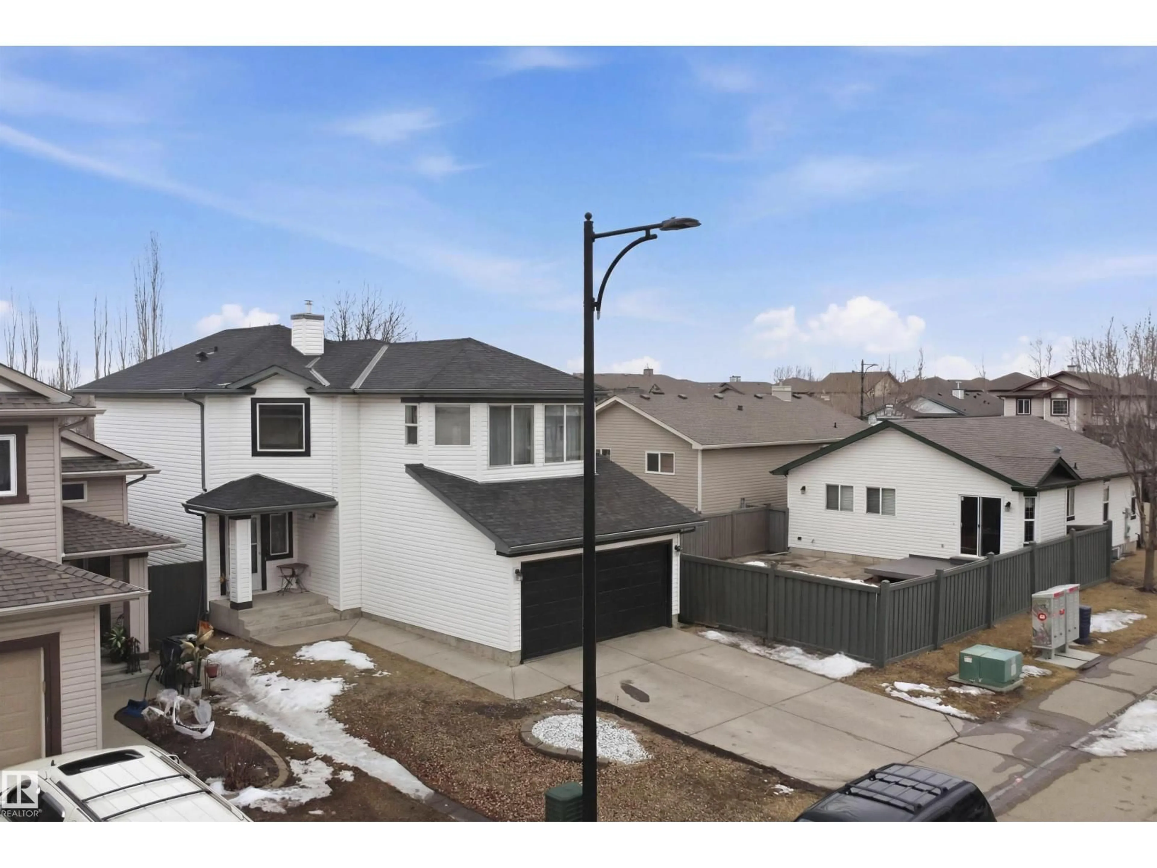 A pic from outside/outdoor area/front of a property/back of a property/a pic from drone, street for NW - 4619 202 ST, Edmonton Alberta T6M2Y1