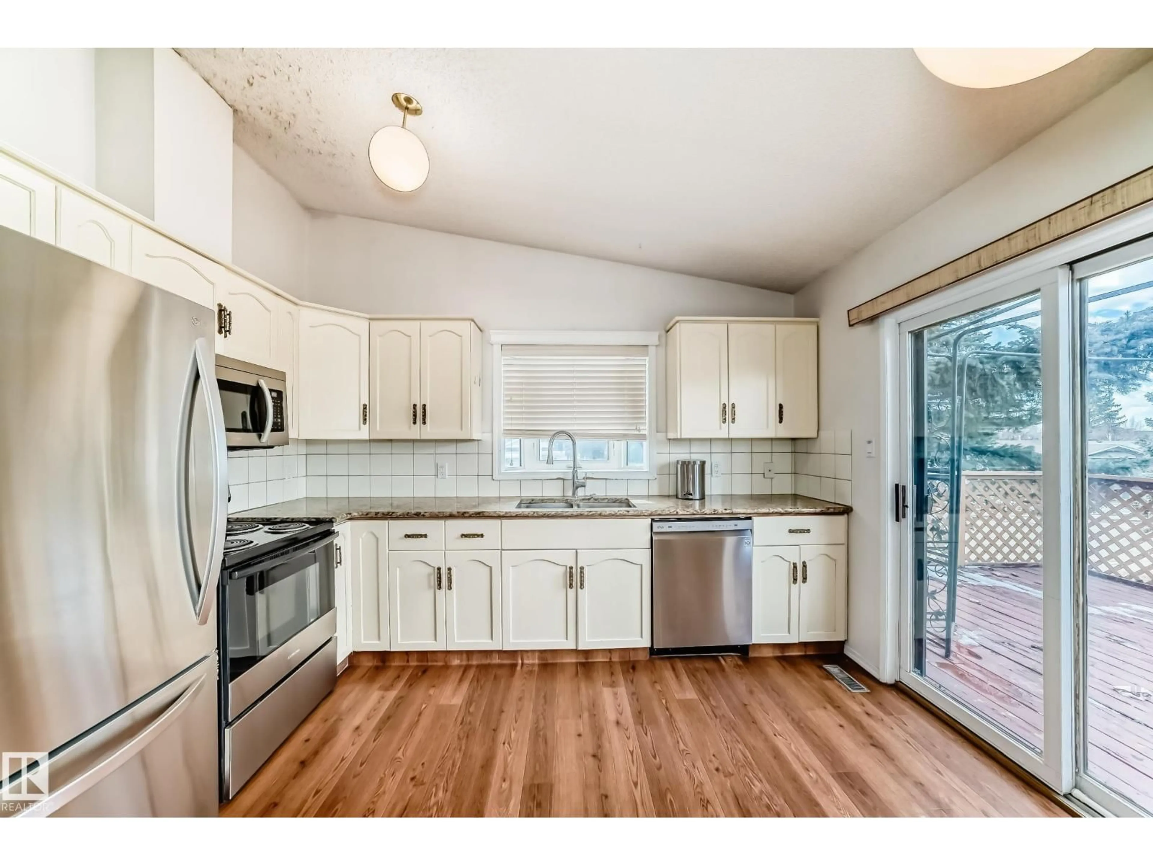 Open concept kitchen, unknown for 4714 26 AV, Edmonton Alberta T6L1J1