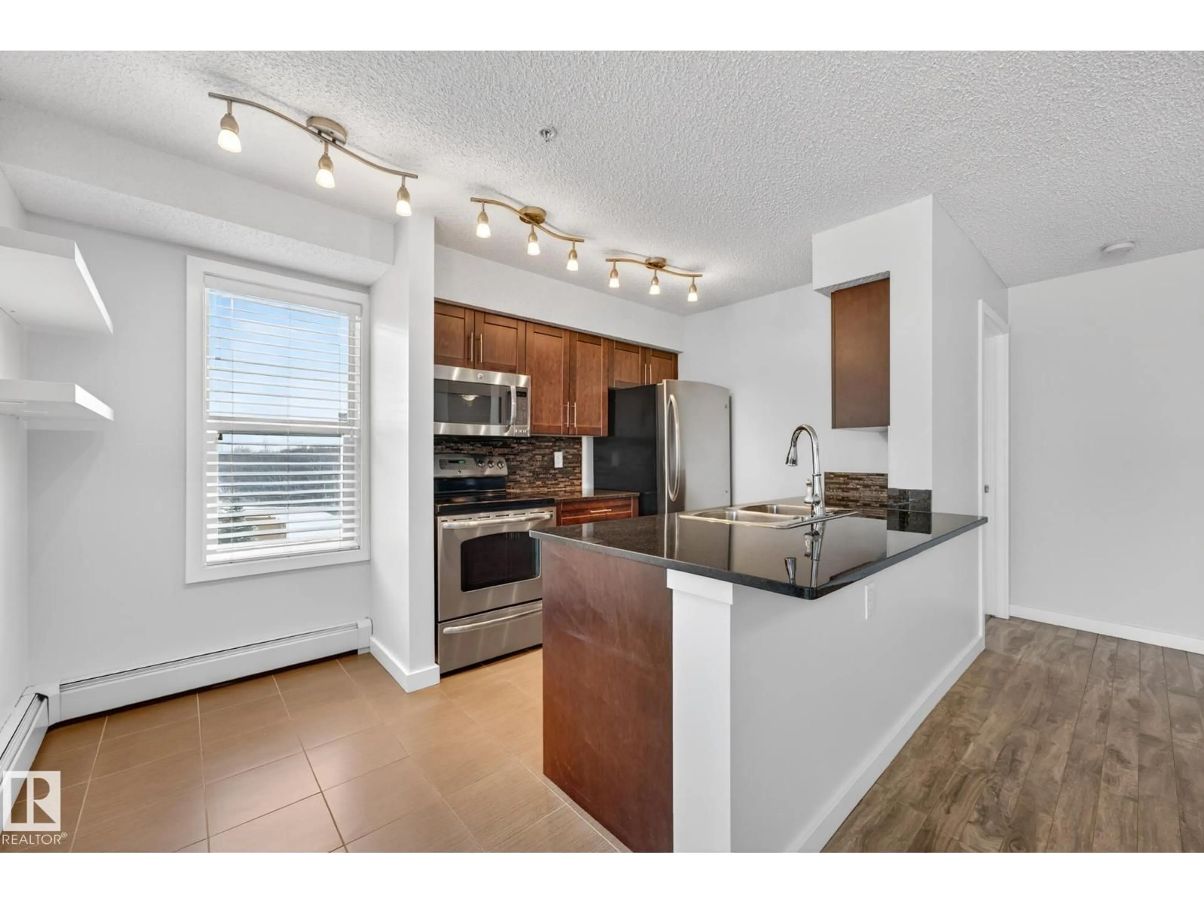 Open concept kitchen, unknown for 301 - 1070 MCCONACHIE BV, Edmonton Alberta T5Y0X1