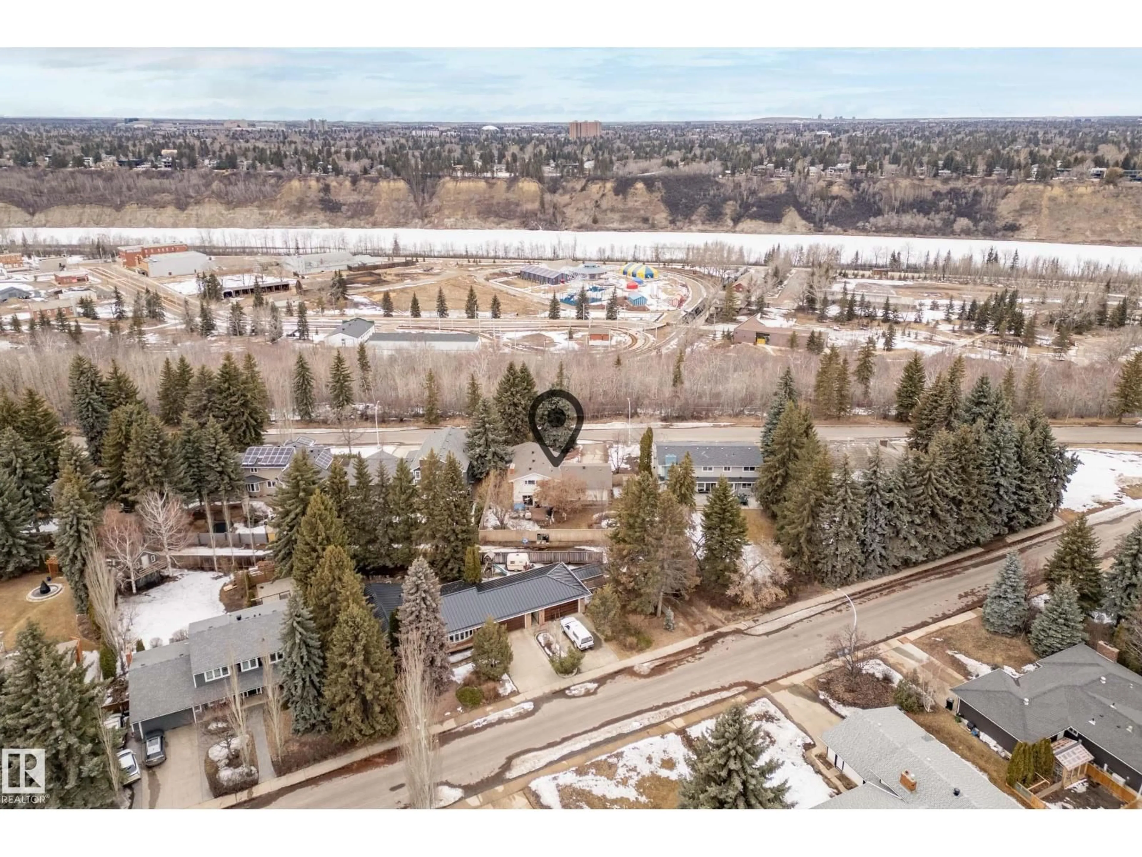 A pic from outside/outdoor area/front of a property/back of a property/a pic from drone, mountain view for 14523 66 AV, Edmonton Alberta T6H1Y9
