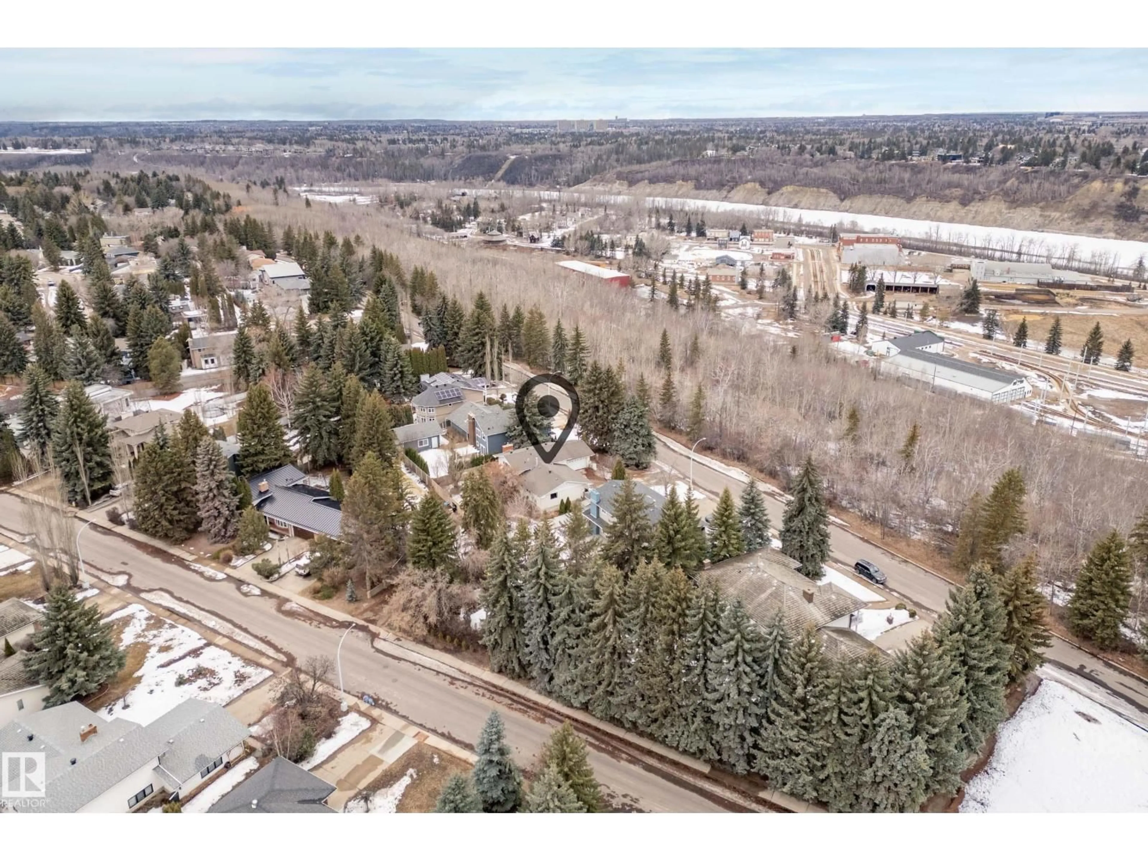 A pic from outside/outdoor area/front of a property/back of a property/a pic from drone, mountain view for 14523 66 AV, Edmonton Alberta T6H1Y9