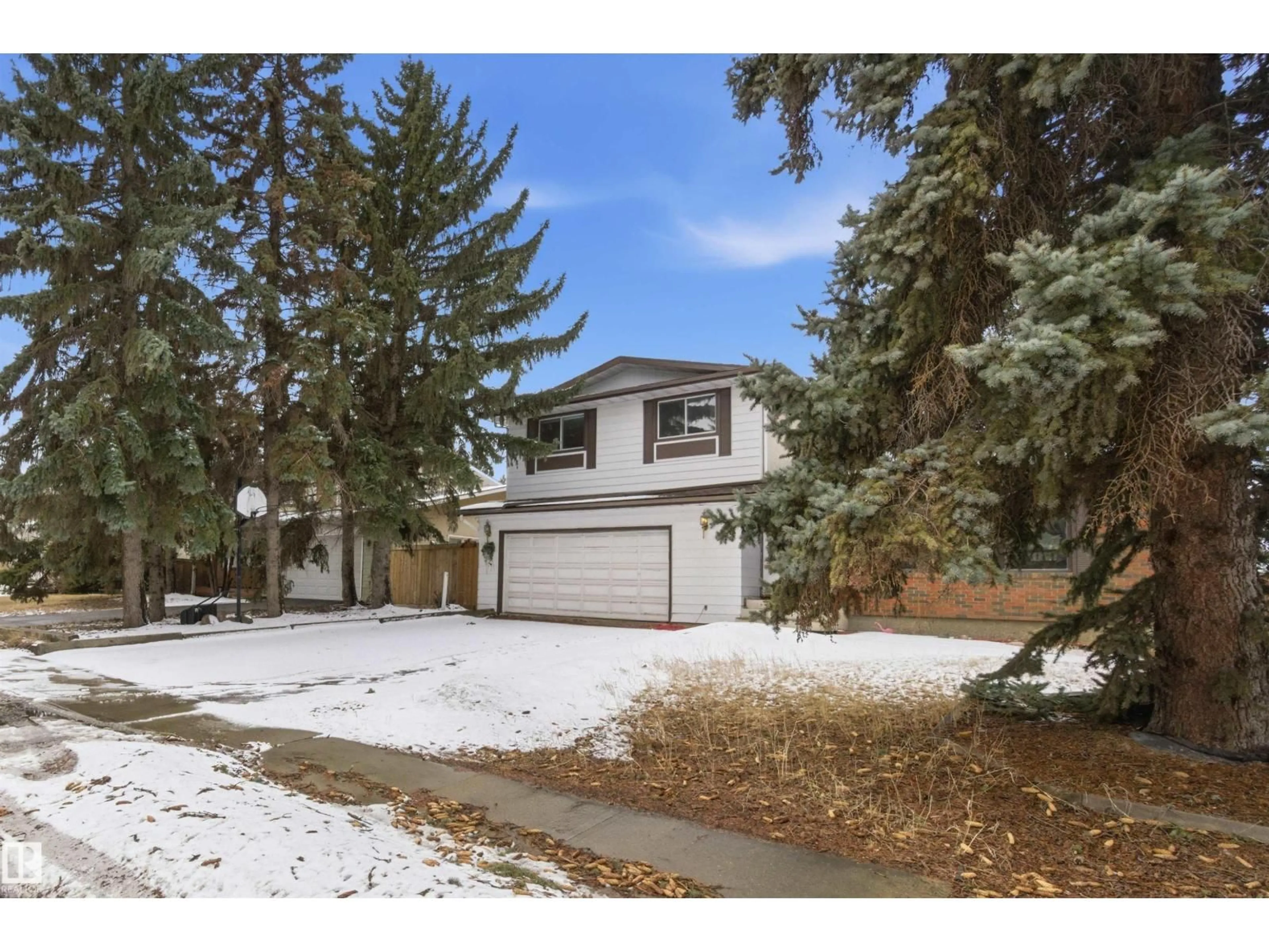 Home with vinyl exterior material, street for NW - 8616 179 ST, Edmonton Alberta T5T0X3