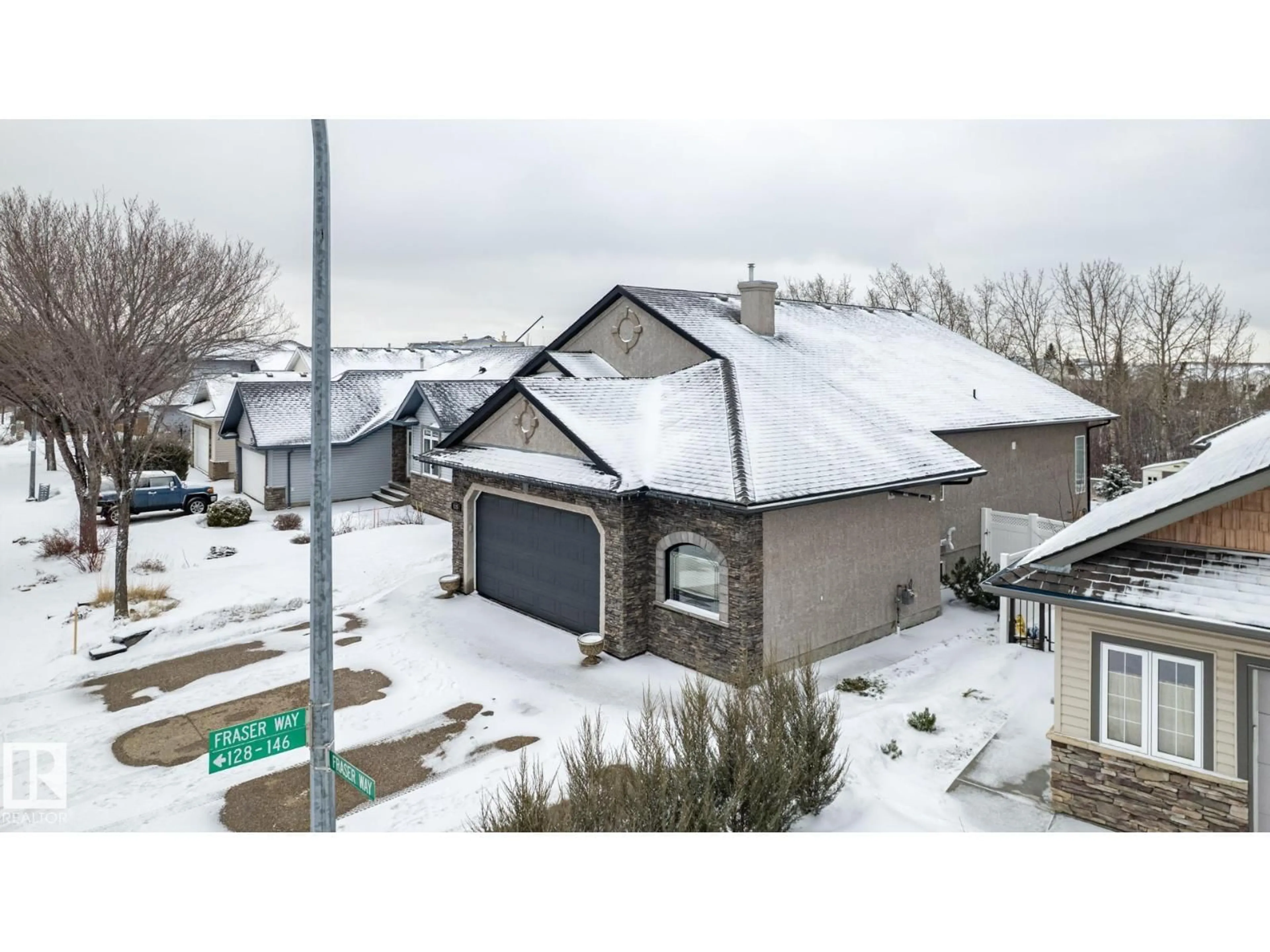 A pic from outside/outdoor area/front of a property/back of a property/a pic from drone, street for 135 FRASER WY, Edmonton Alberta T5Y3M8