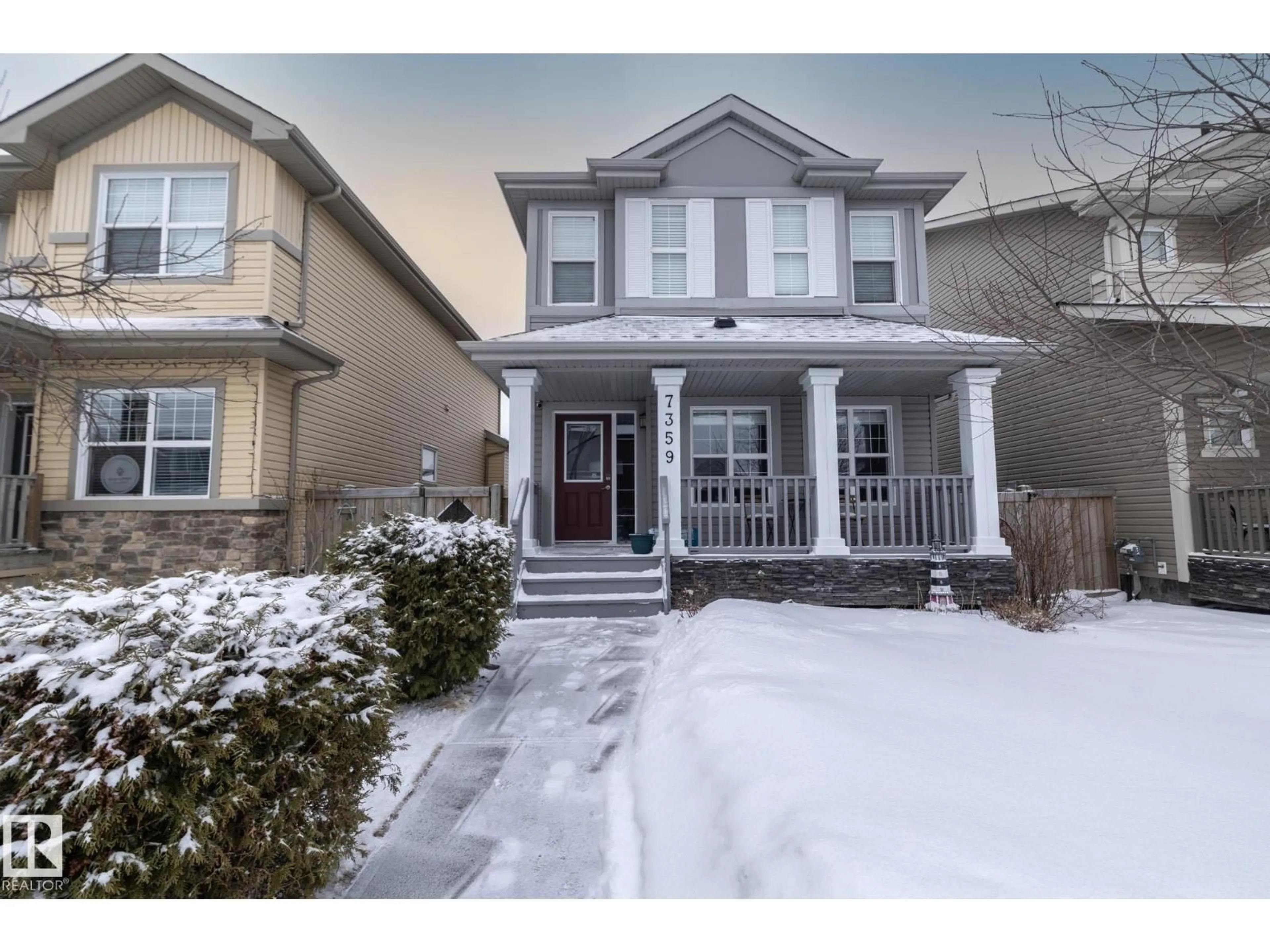 Home with vinyl exterior material, street for 7359 179 AV, Edmonton Alberta T5Z0M7