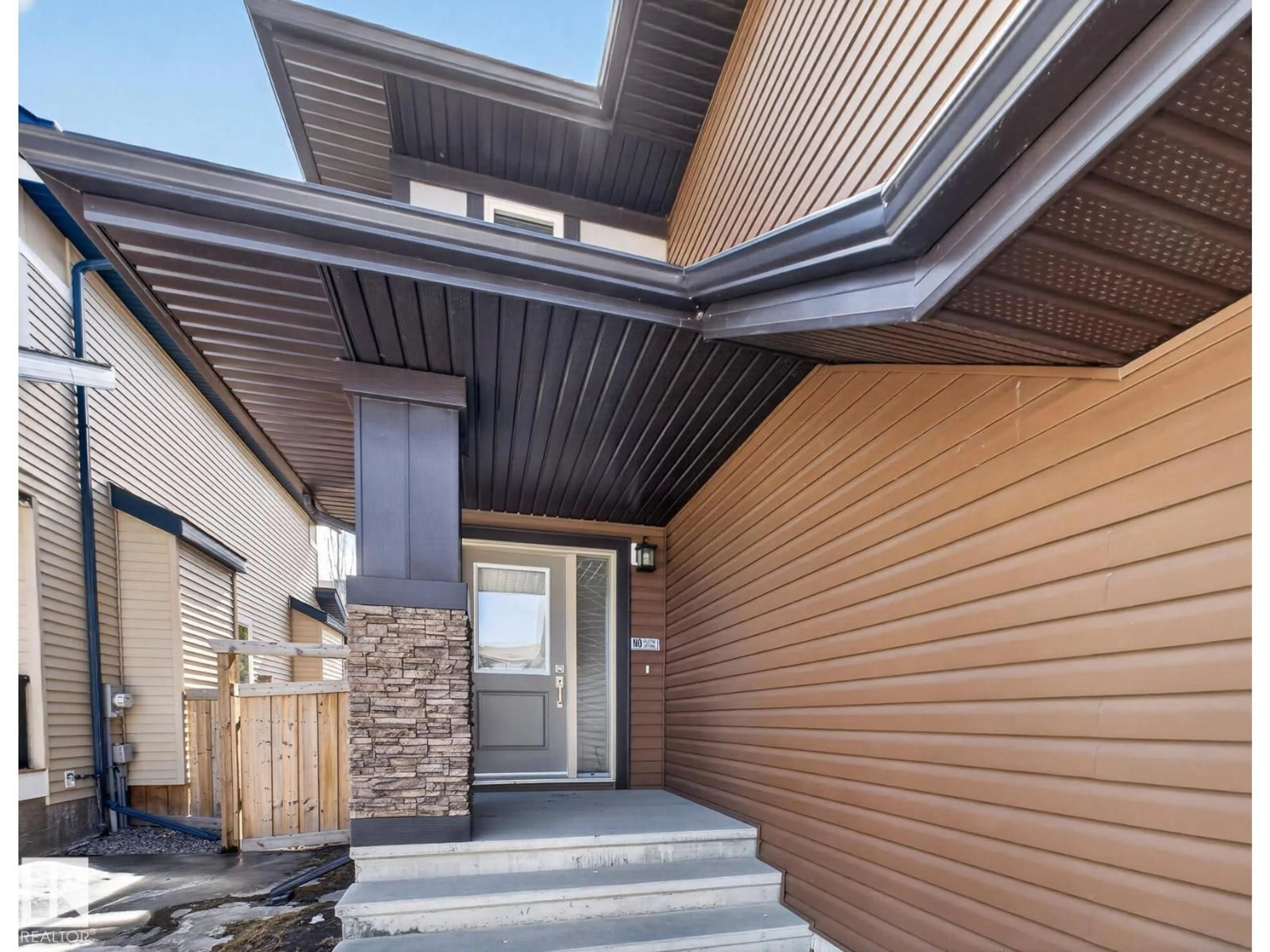 Home with vinyl exterior material, street for 718 ADAMS WY, Edmonton Alberta T6R5K2