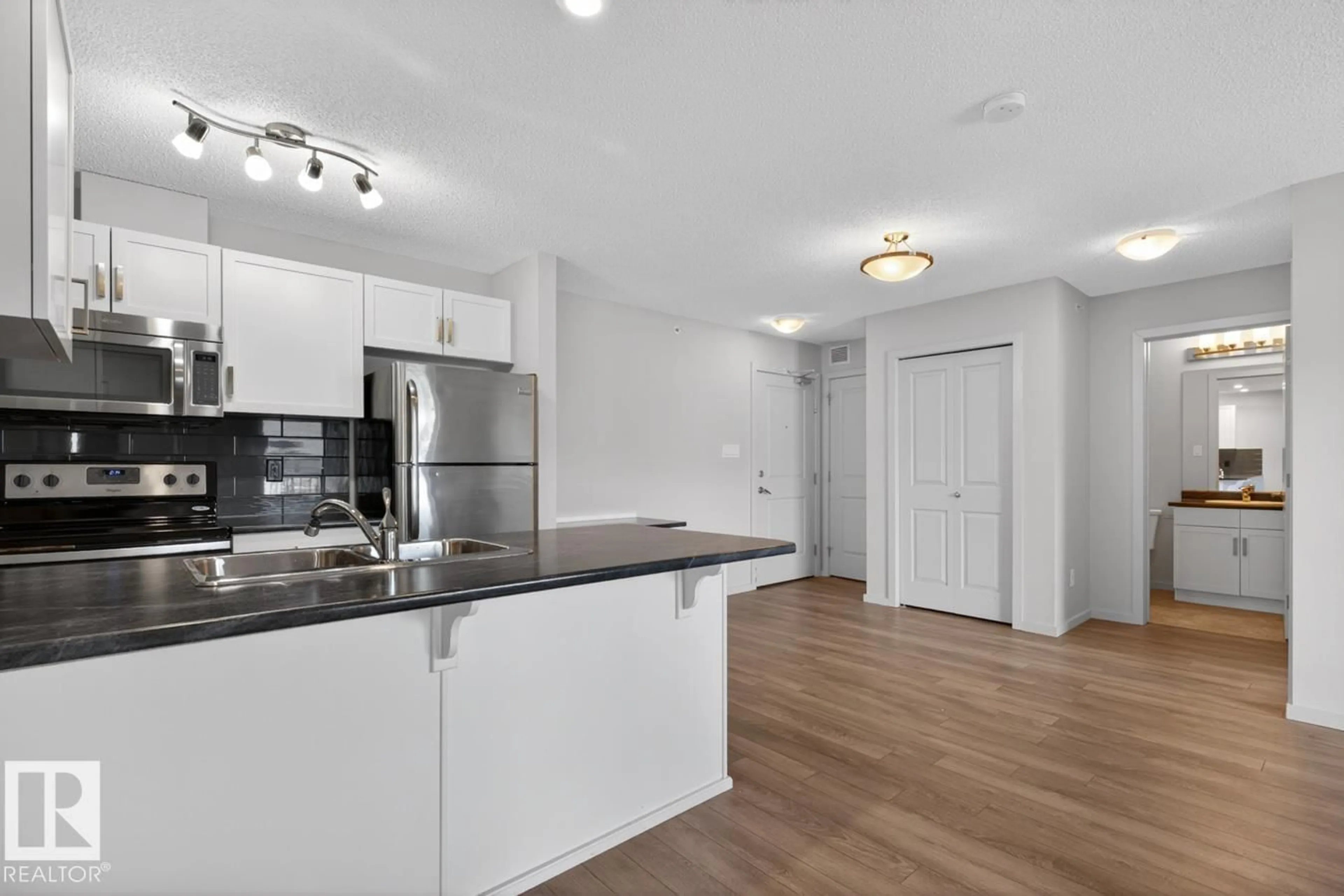 Standard kitchen, wood/laminate floor for 390 - 426 WINDERMERE RD, Edmonton Alberta T6W0R1