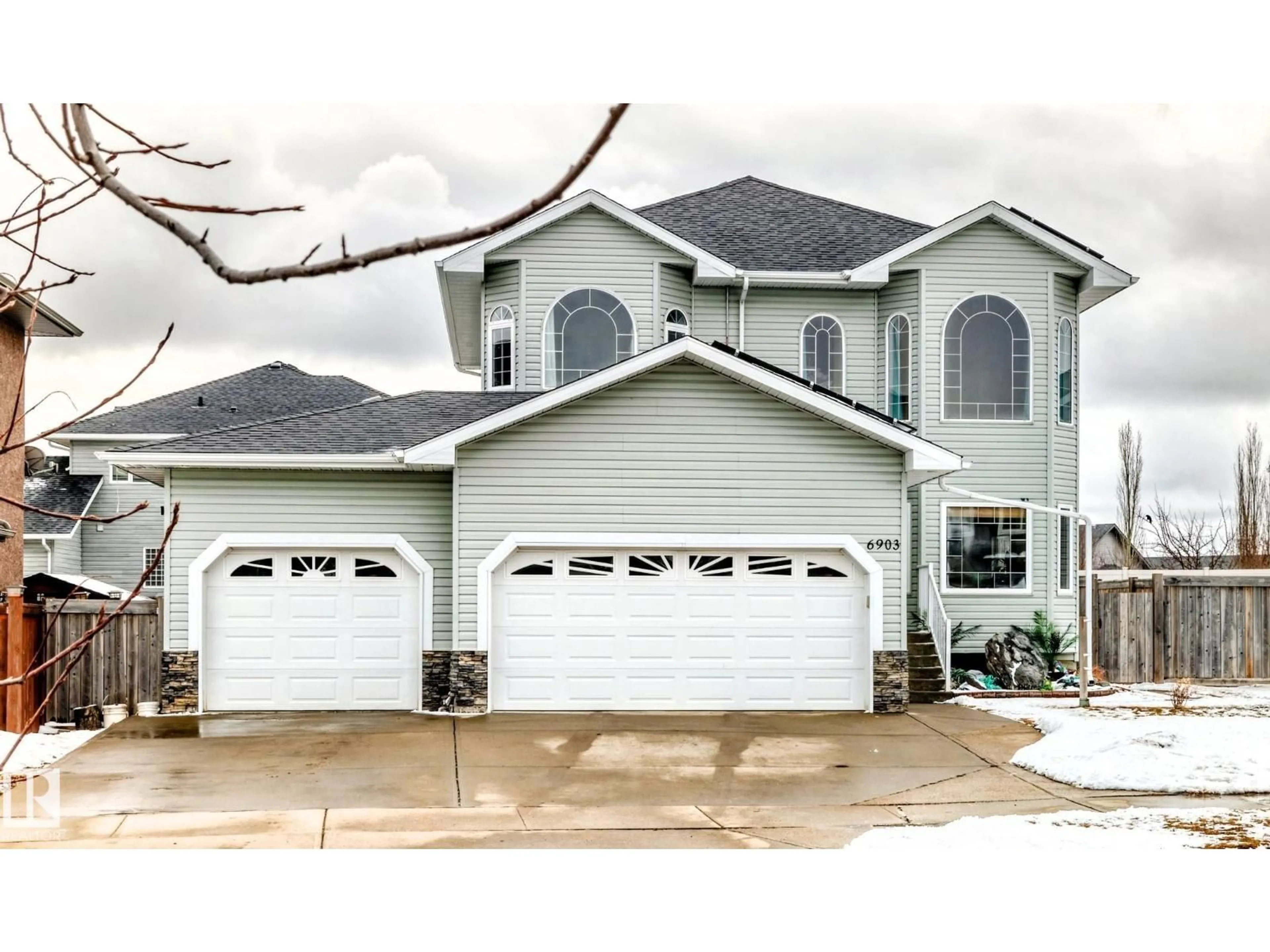 Home with vinyl exterior material, street for 6903 38 AV, Camrose Alberta T4V5A8