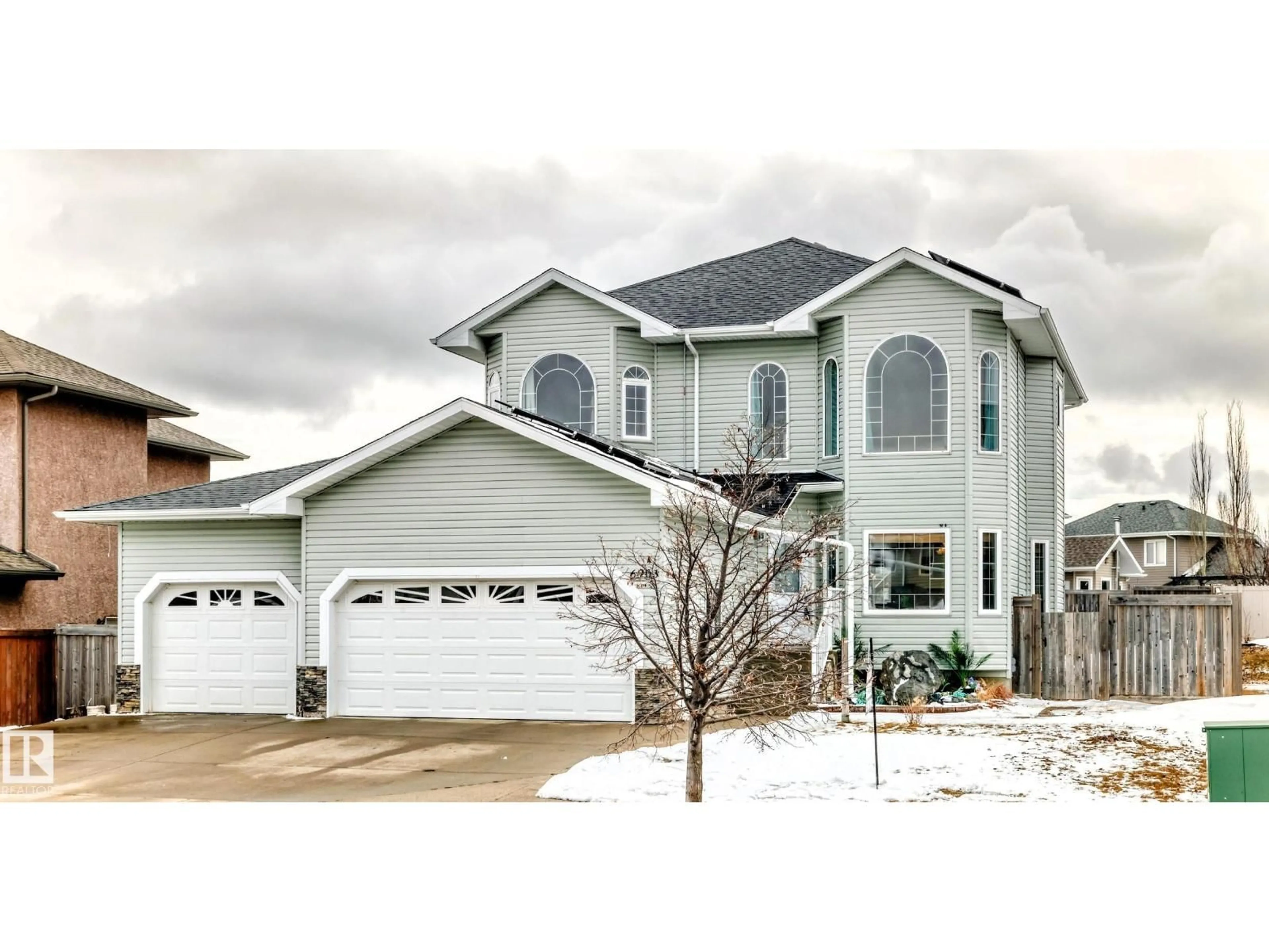 Home with vinyl exterior material, street for 6903 38 AV, Camrose Alberta T4V5A8