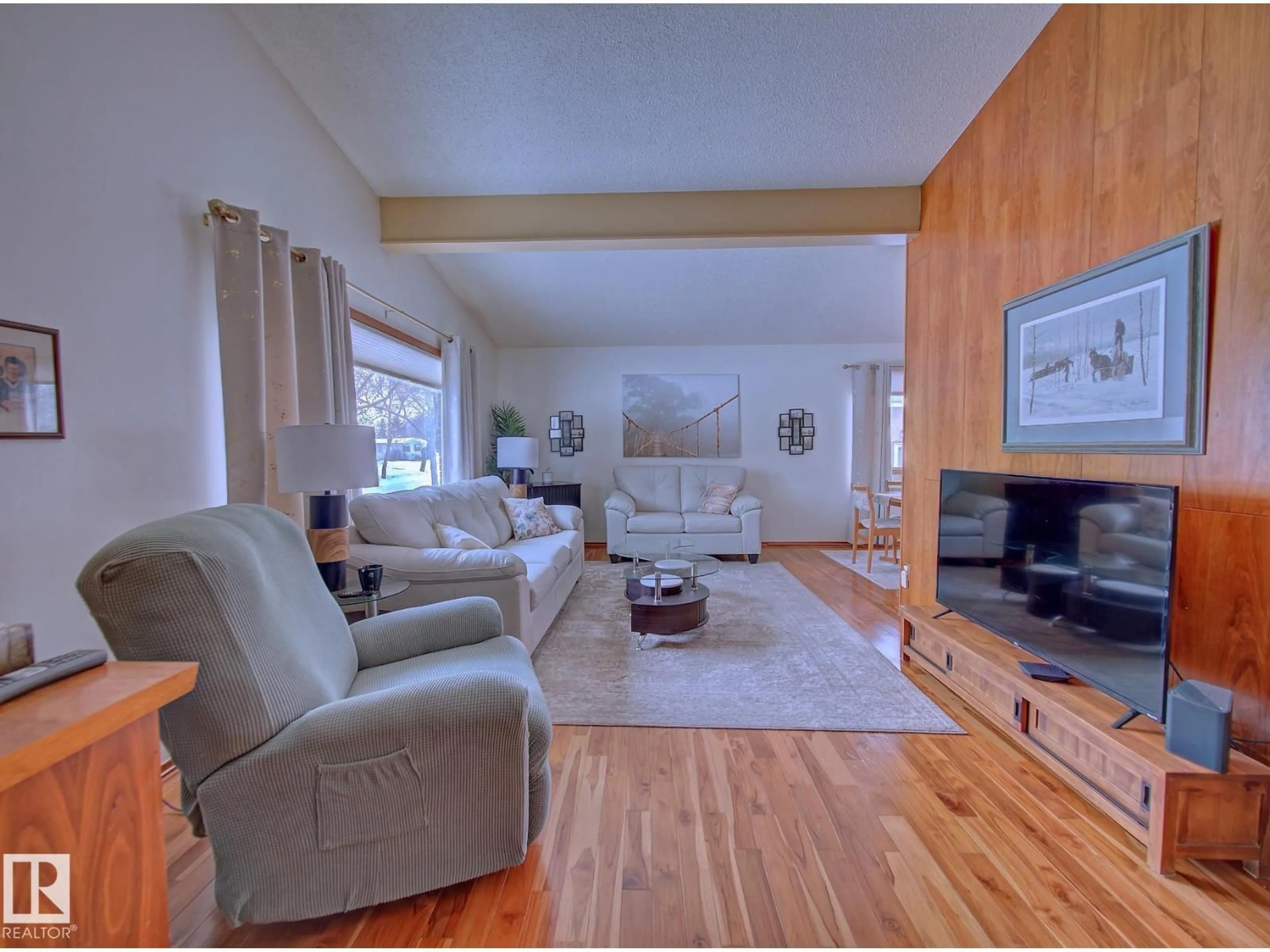Living room with furniture, wood/laminate floor for 9611 90 AV, Fort Saskatchewan Alberta T8L1M4
