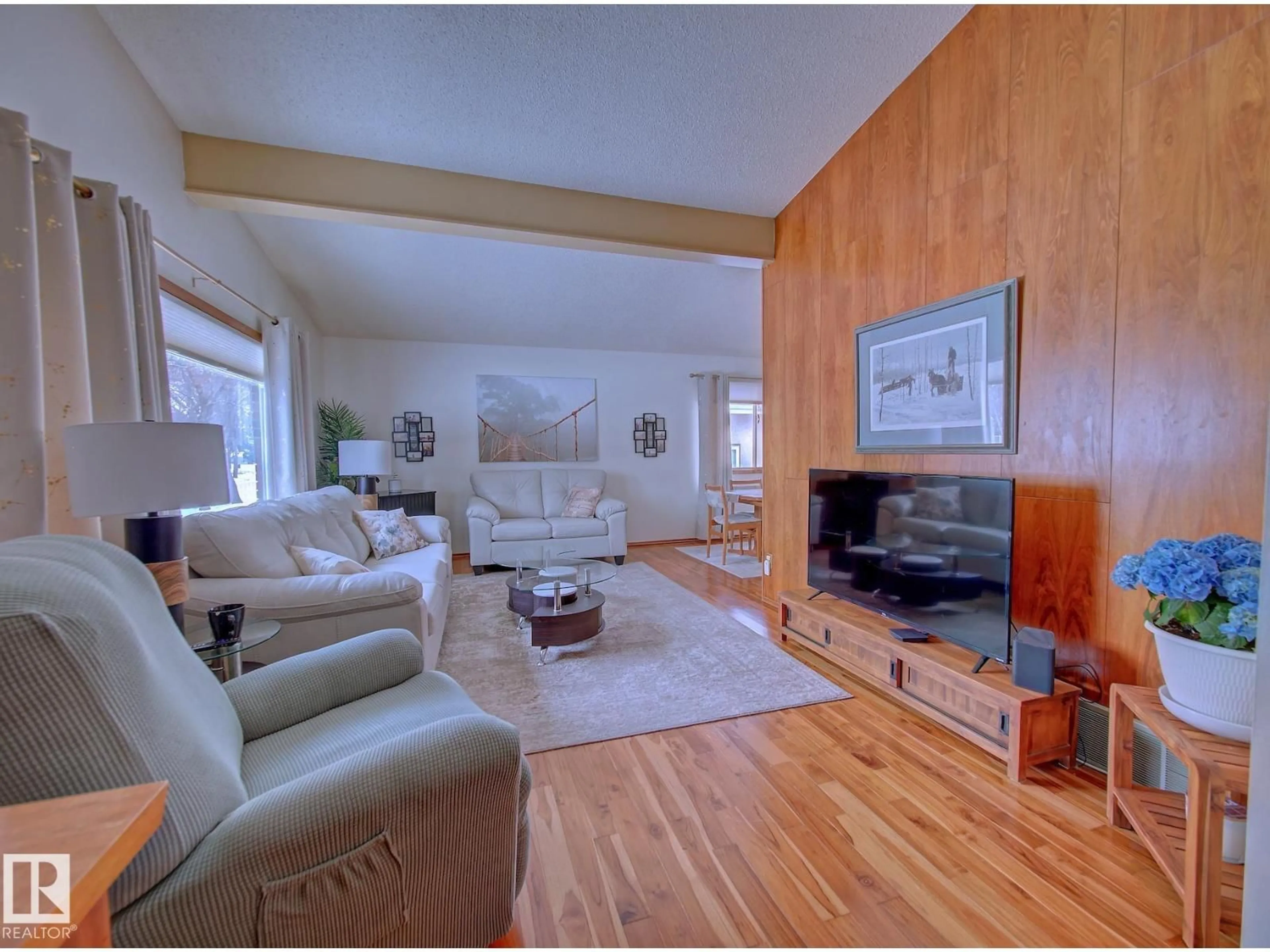 Living room with furniture, wood/laminate floor for 9611 90 AV, Fort Saskatchewan Alberta T8L1M4