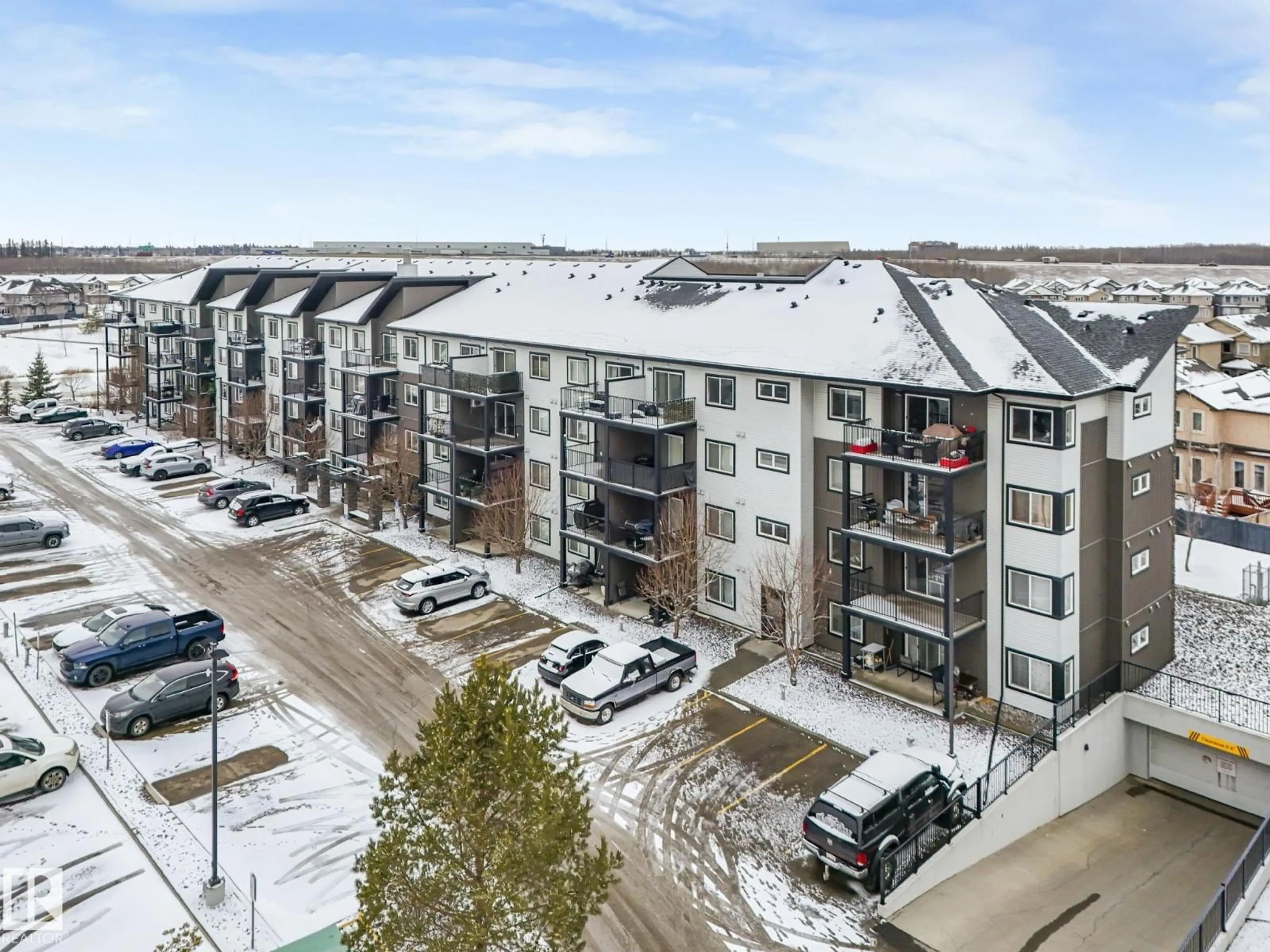 A pic from outside/outdoor area/front of a property/back of a property/a pic from drone, city buildings view from balcony for 508 - 110 ALBANY WY, Edmonton Alberta T6V0L1