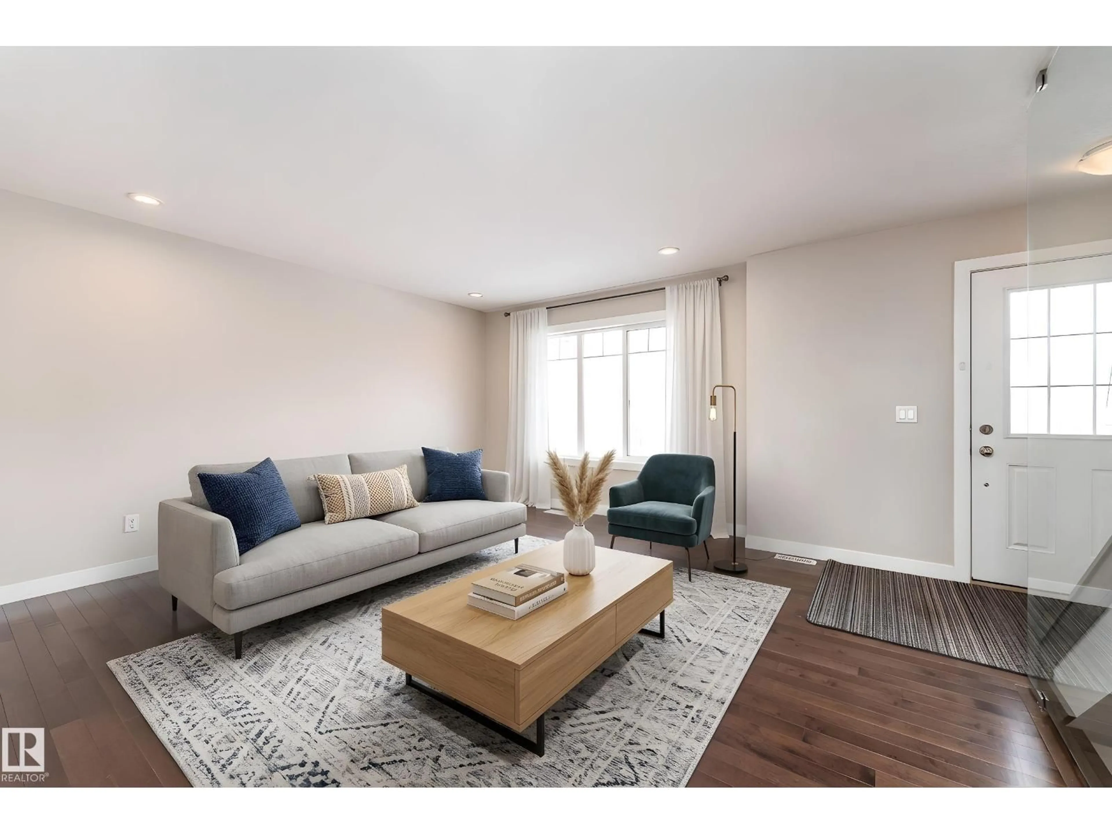 Living room with furniture, wood/laminate floor for #10 - 9535 217 ST, Edmonton Alberta T5T4P5