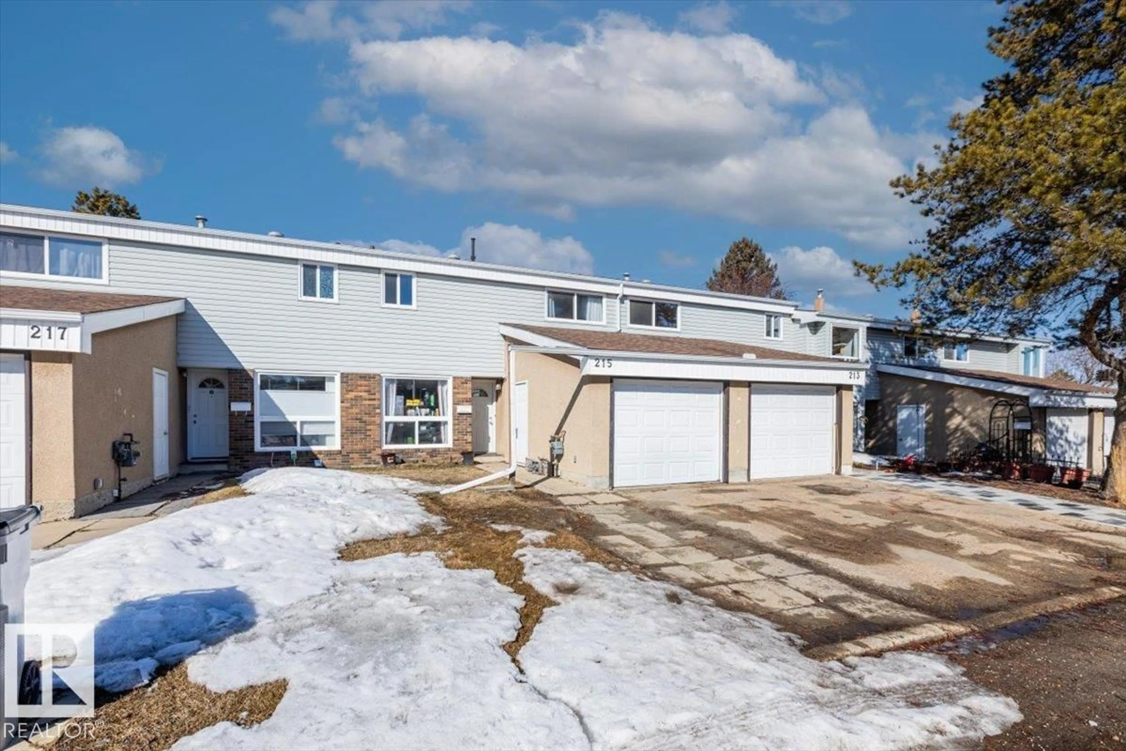 A pic from outside/outdoor area/front of a property/back of a property/a pic from drone, unknown for 215 GRANDIN VG, St. Albert Alberta T8N2J3