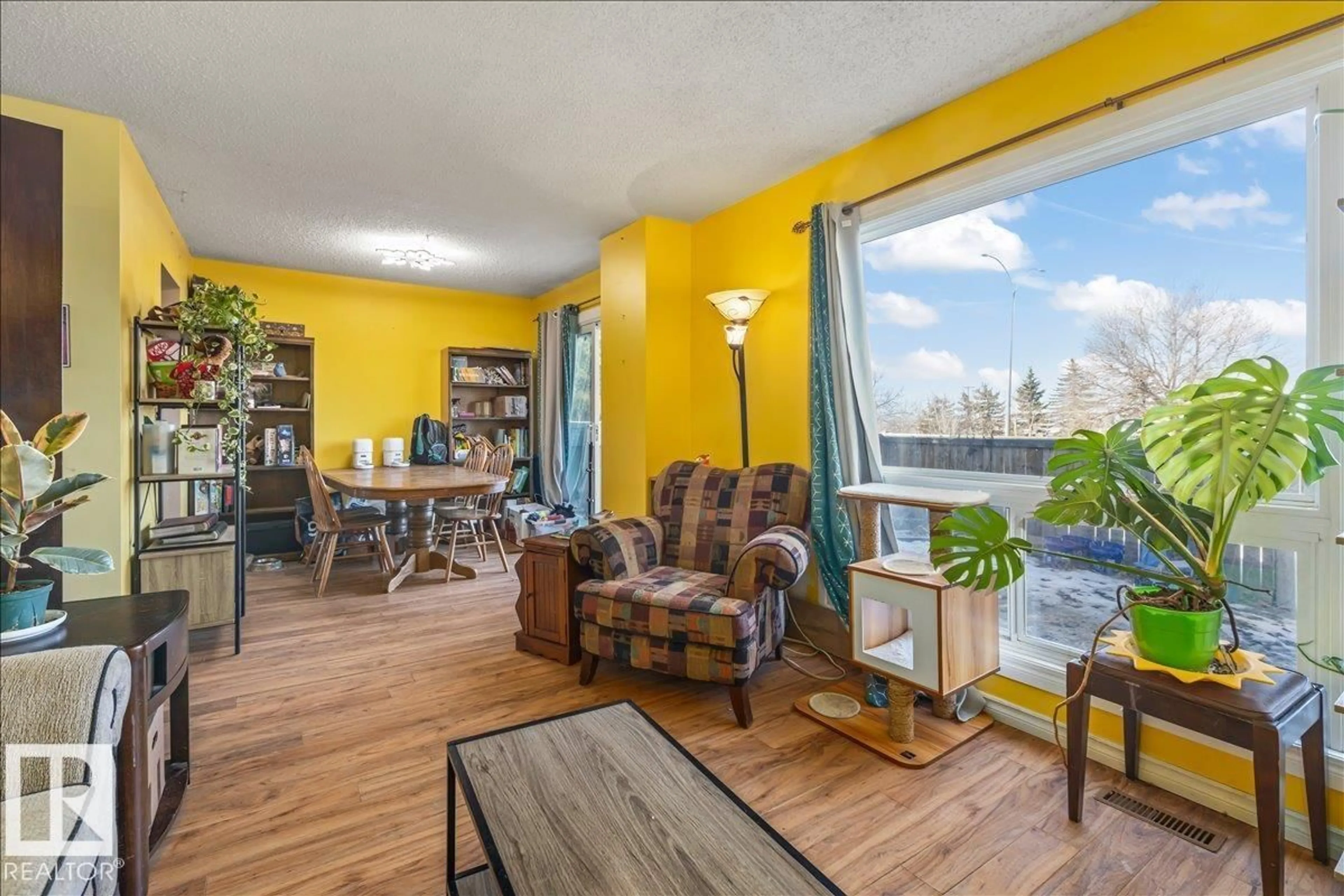 Living room with furniture, wood/laminate floor for 215 GRANDIN VG, St. Albert Alberta T8N2J3