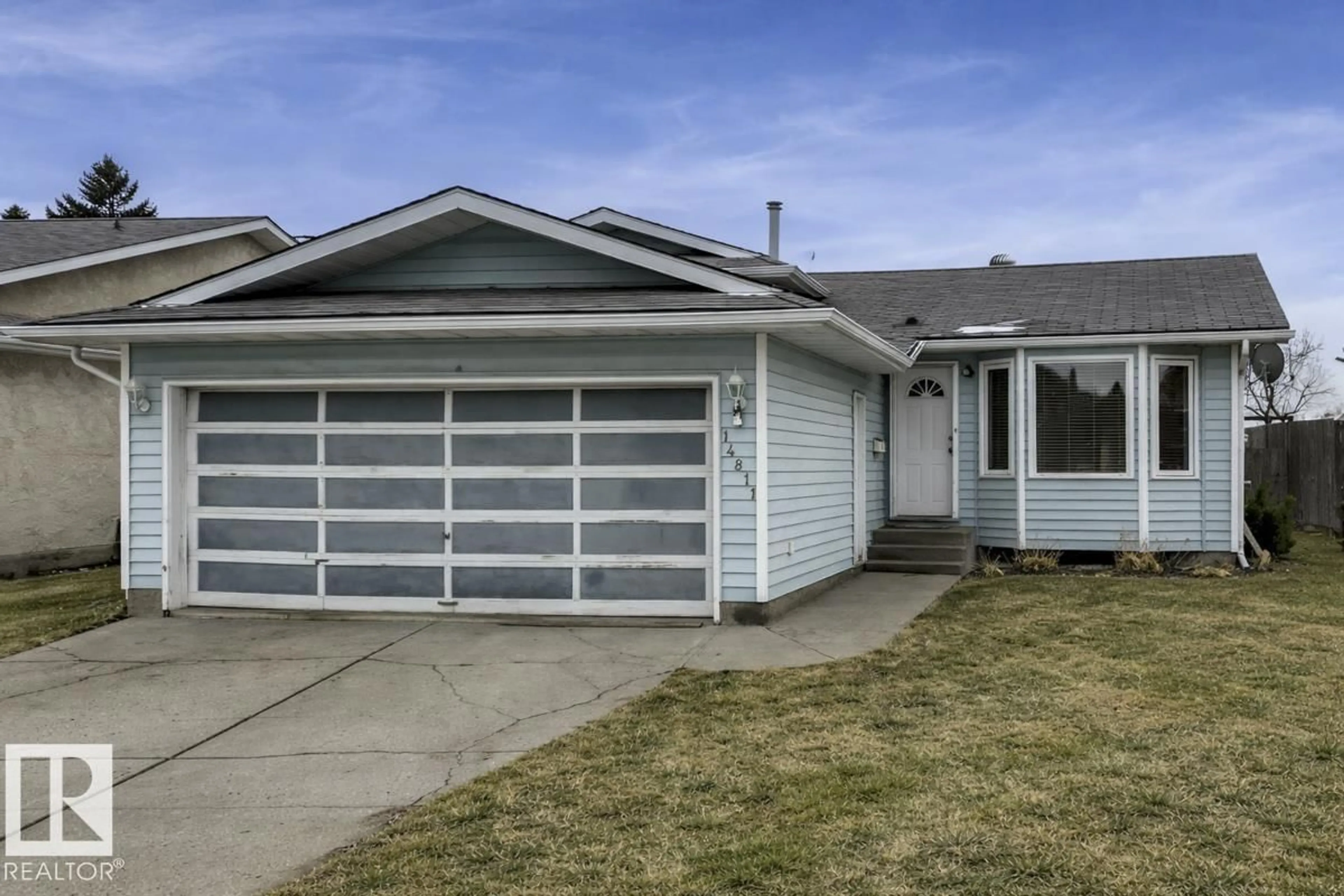 Home with vinyl exterior material, street for NW - 14811 35 ST, Edmonton Alberta T5Y2H8