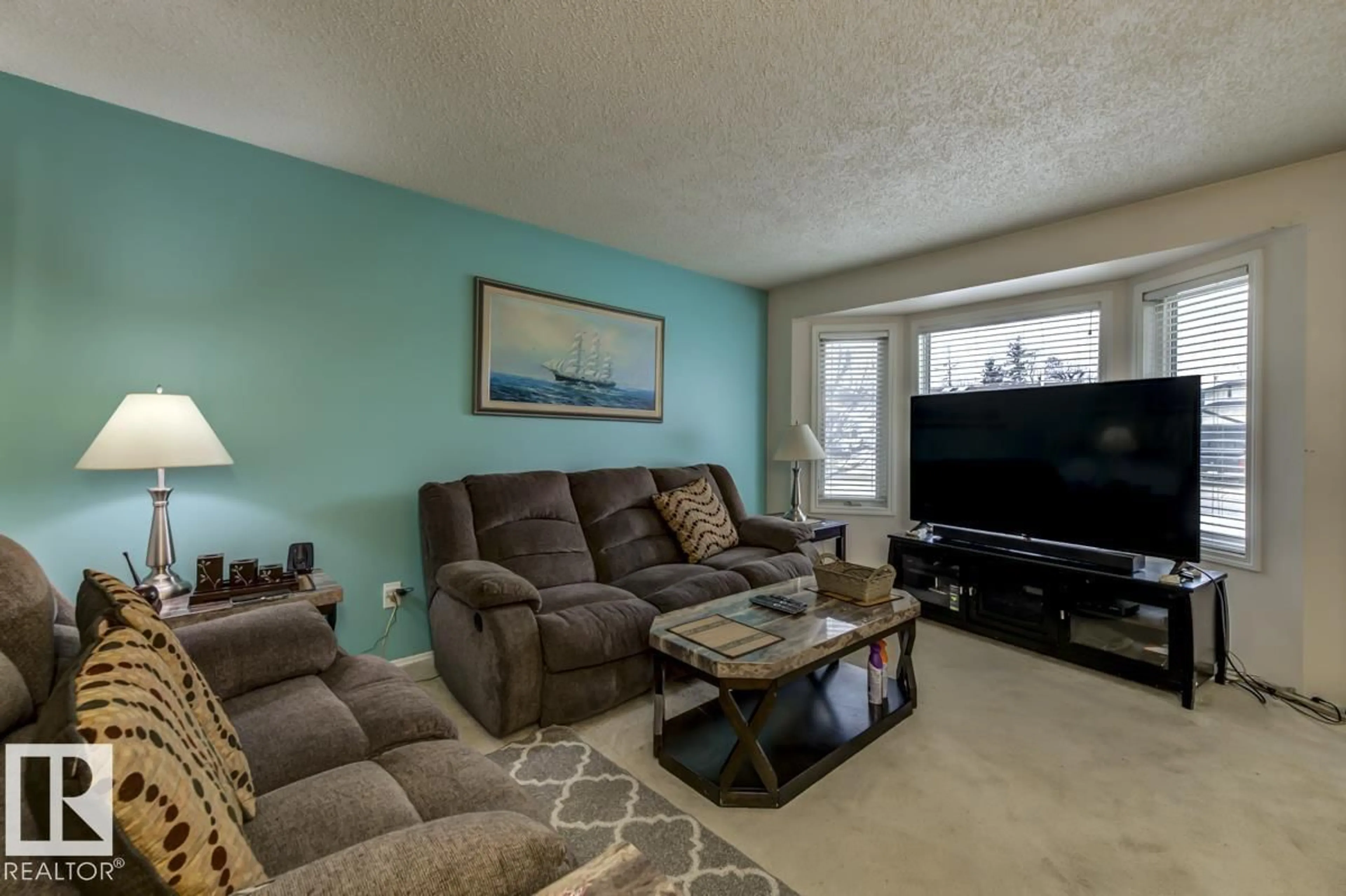 Living room with furniture, unknown for NW - 14811 35 ST, Edmonton Alberta T5Y2H8
