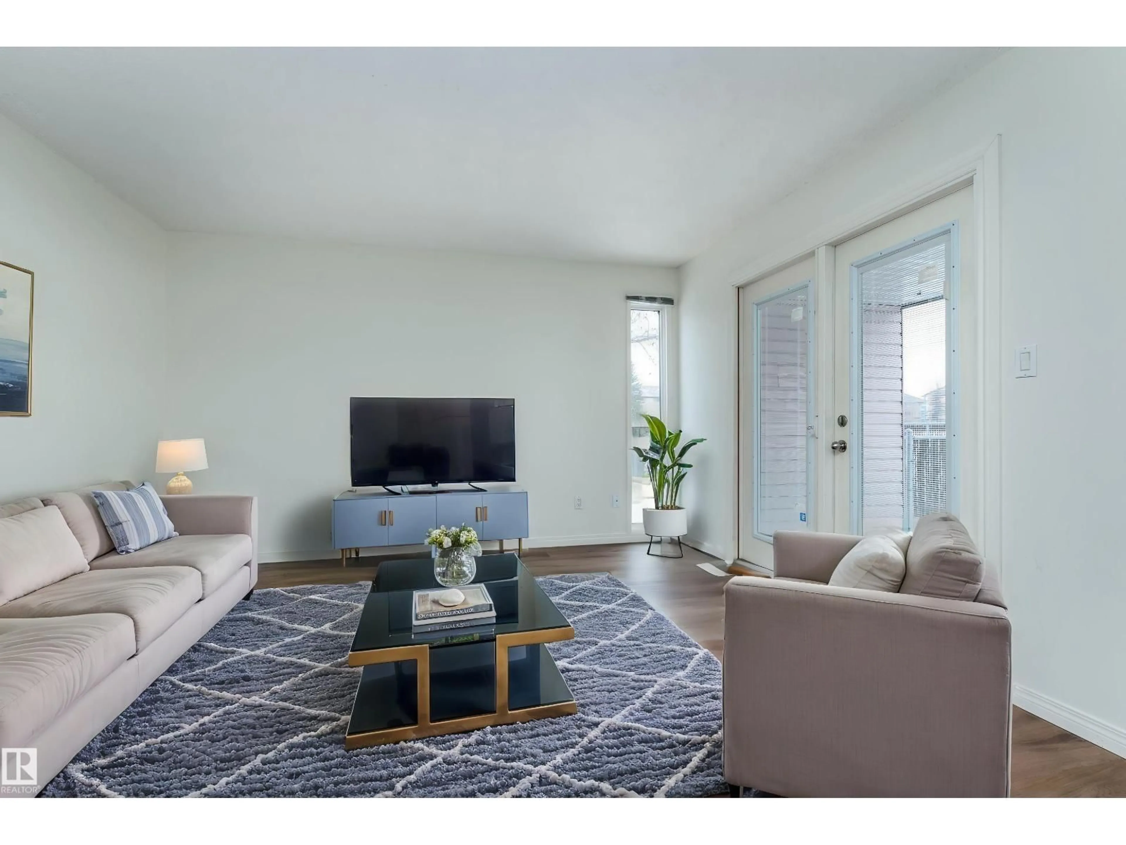 Living room with furniture, unknown for NW - 14636 25 ST, Edmonton Alberta T5Y1X4