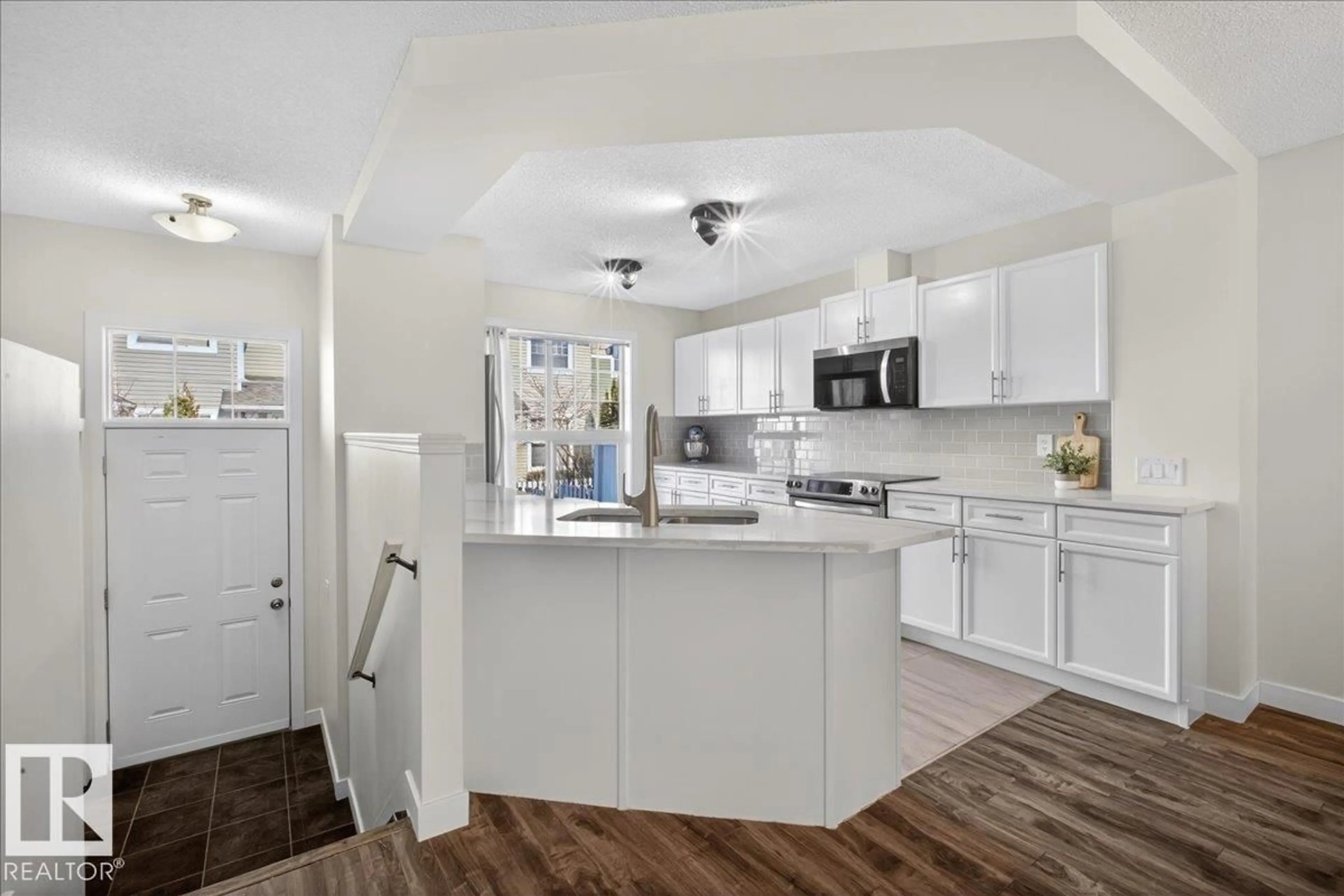 Open concept kitchen, unknown for #174 - 5604 199 ST, Edmonton Alberta T6M2Z9