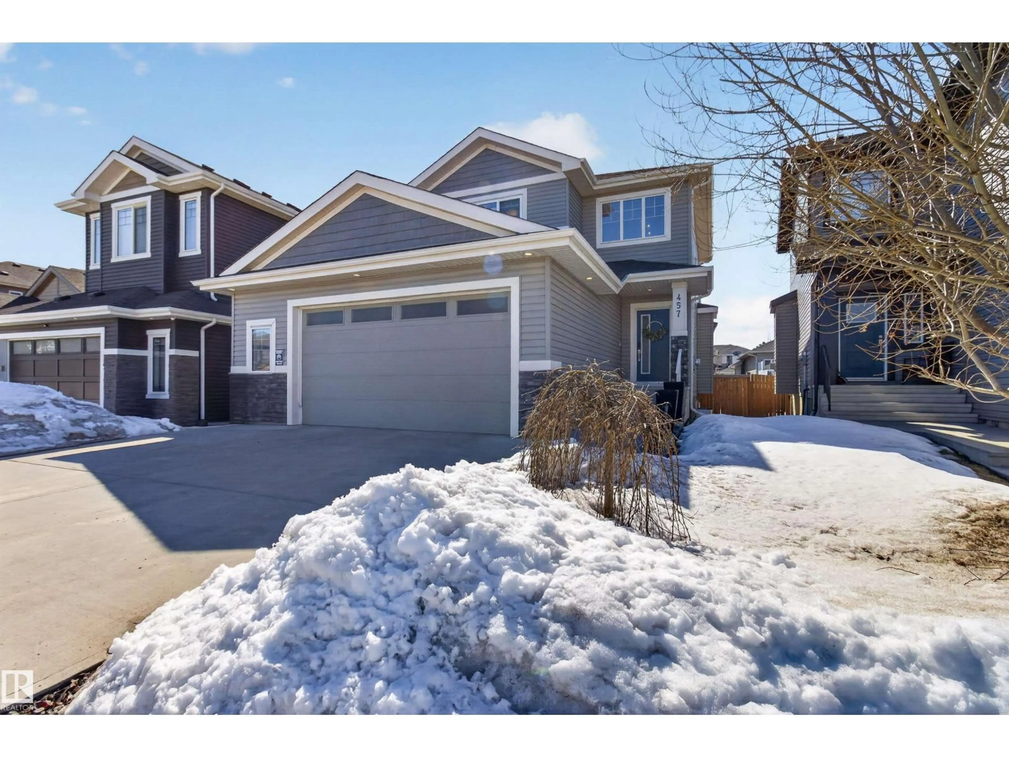 Home with vinyl exterior material, street for 457 MEADOWVIEW DR, Fort Saskatchewan Alberta T8L0N9
