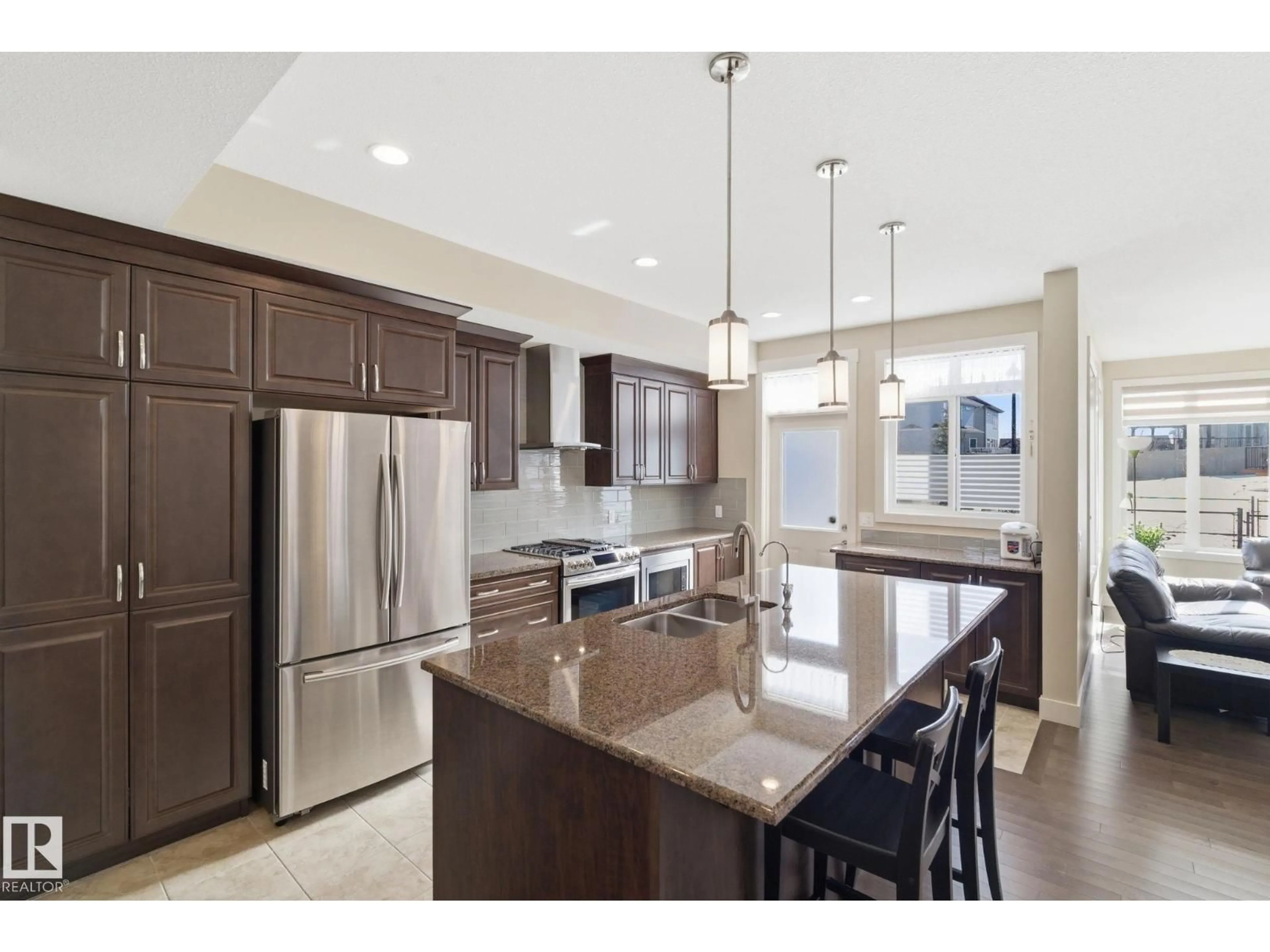 Open concept kitchen, ceramic/tile floor for 3235 ABBOTT CR, Edmonton Alberta T6W1A8