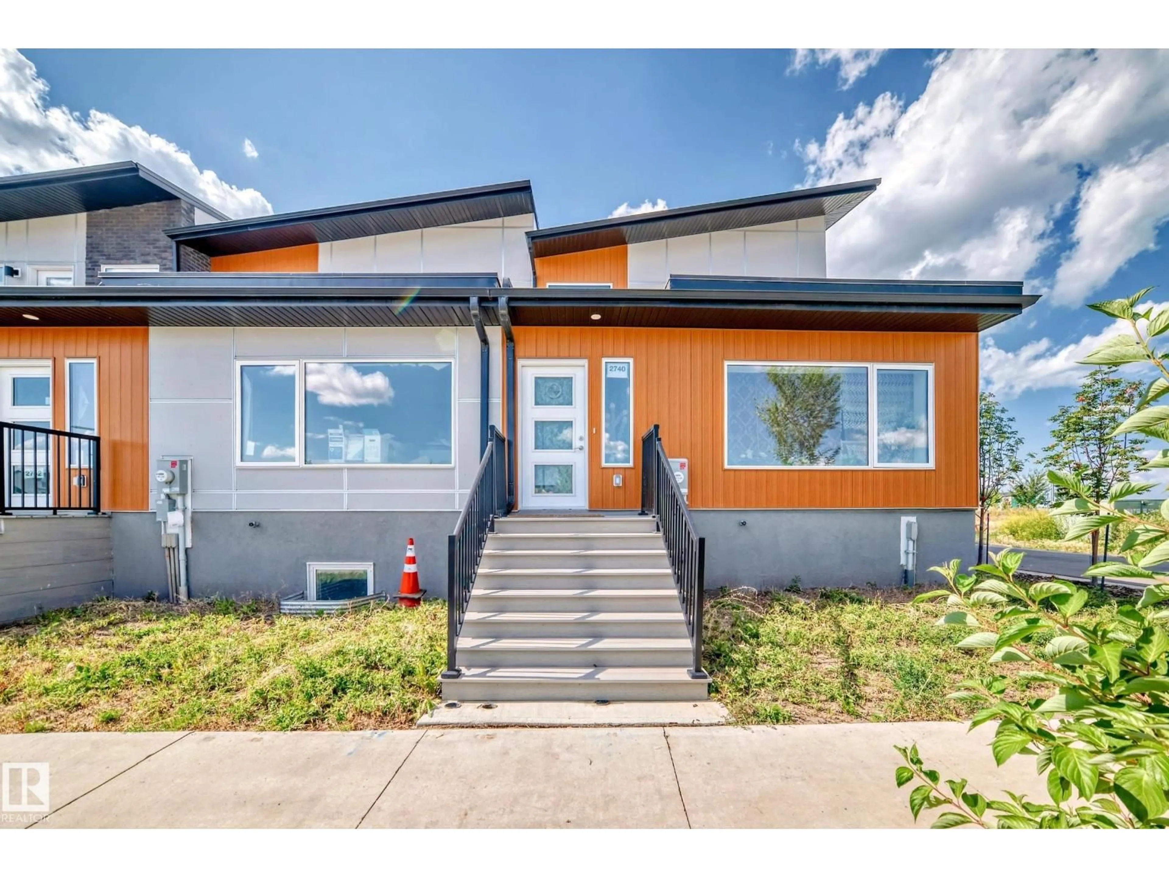 Home with vinyl exterior material, street for 2740 BLATCHFORD RD, Edmonton Alberta T5G0W6