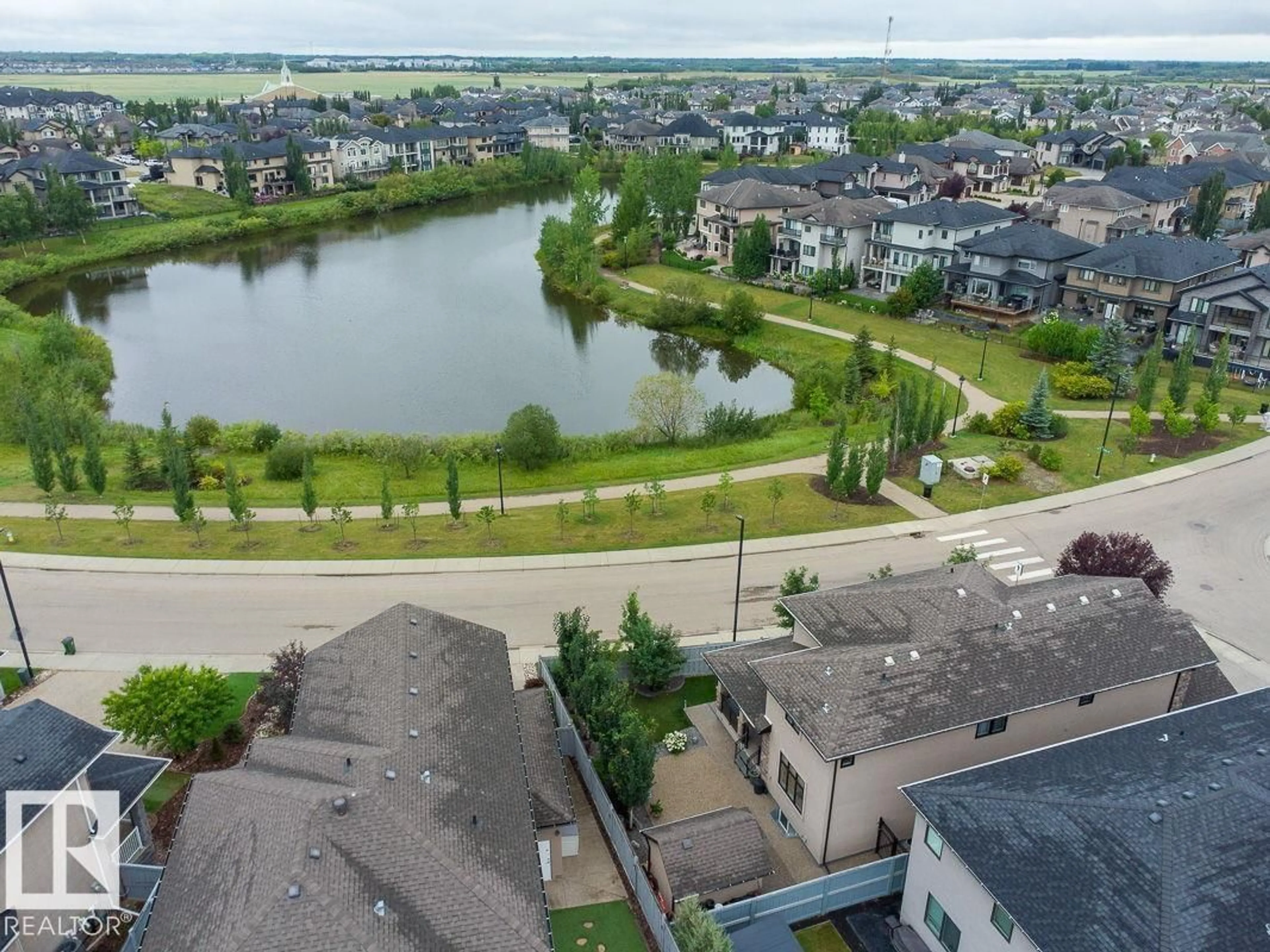 A pic from outside/outdoor area/front of a property/back of a property/a pic from drone, water/lake/river/ocean view for 10617 174A AV, Edmonton Alberta T5X0E3