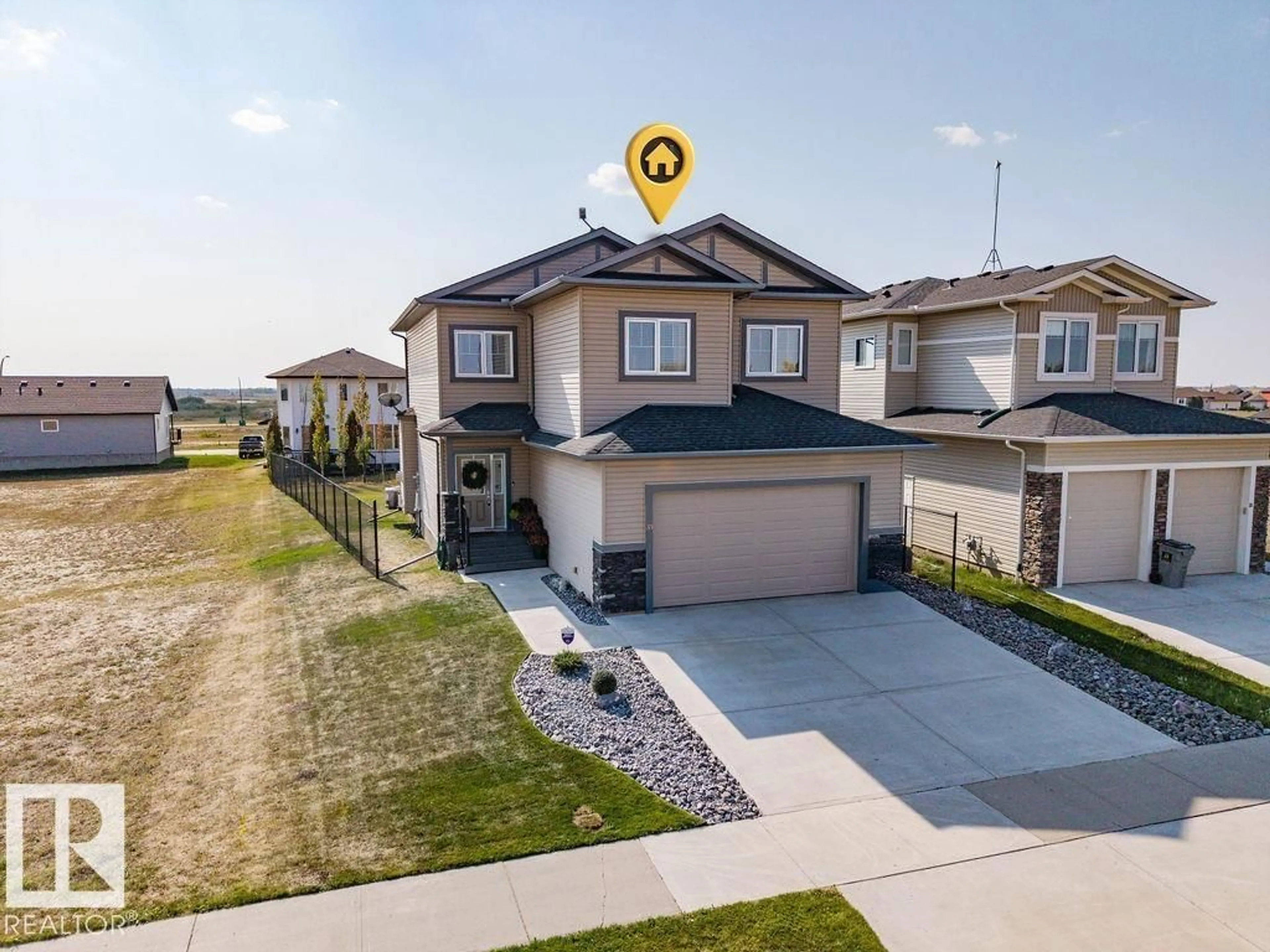 A pic from outside/outdoor area/front of a property/back of a property/a pic from drone, street for 33 WHITETAIL RD, Mundare Alberta T0B3H0