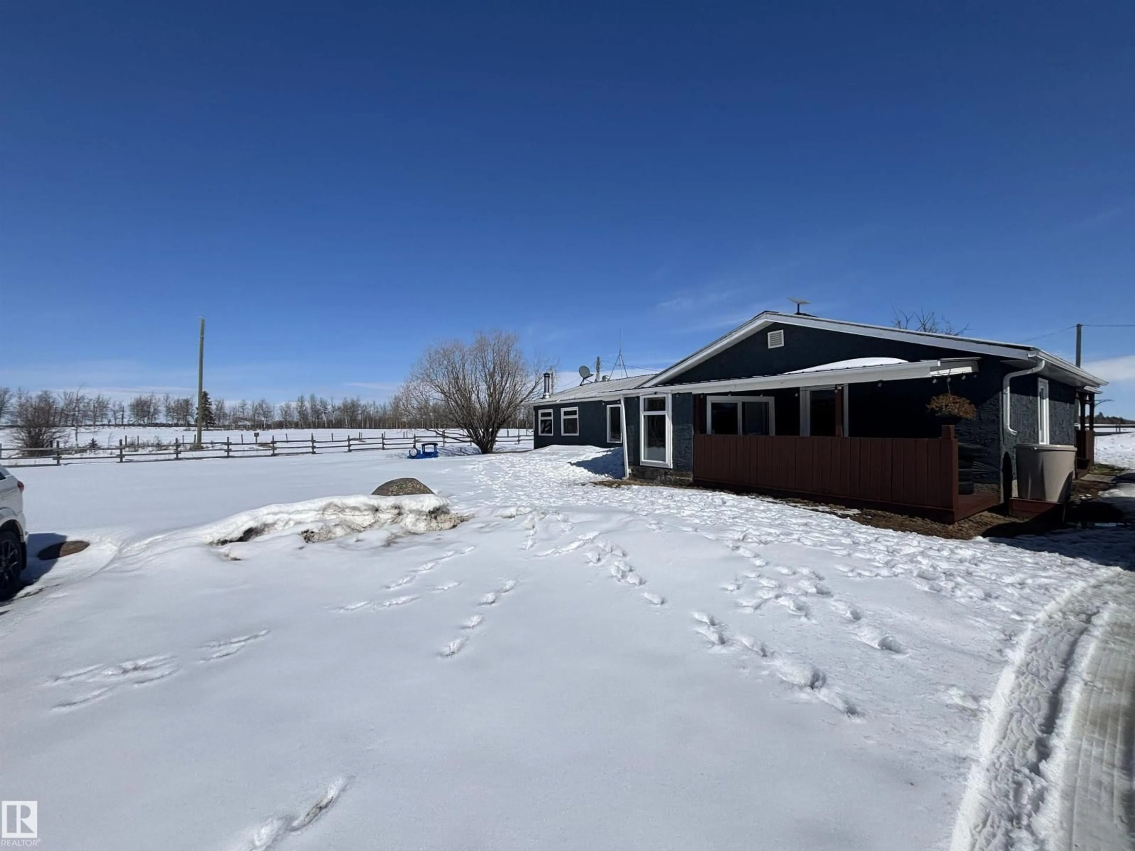 A pic from outside/outdoor area/front of a property/back of a property/a pic from drone, water/lake/river/ocean view for 19 23422 TWP ROAD 582, Rural Sturgeon County Alberta T0G1L2