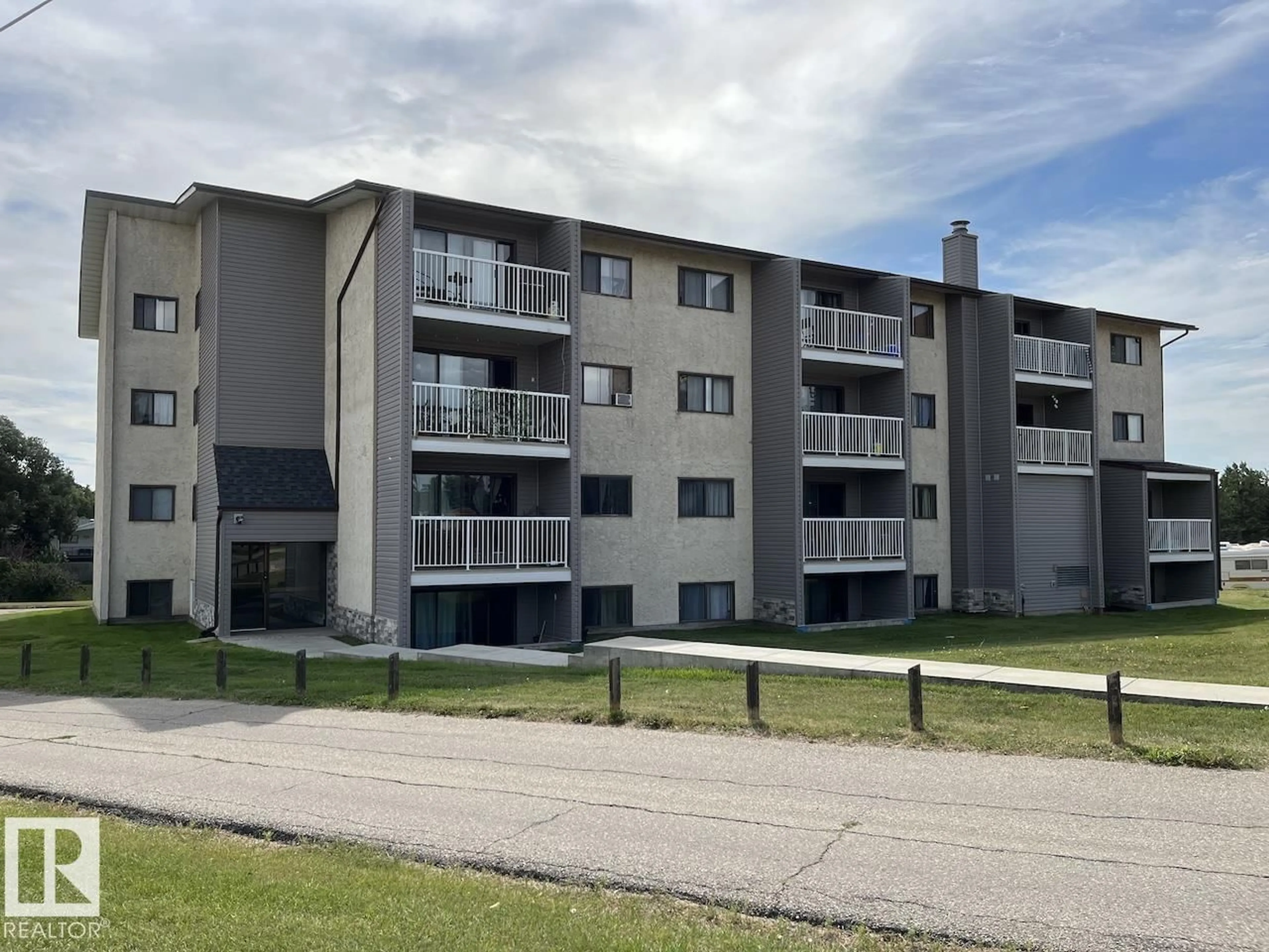 A pic from outside/outdoor area/front of a property/back of a property/a pic from drone, building for 57 - 201 BROWN ST, Stony Plain Alberta T7Z1P2