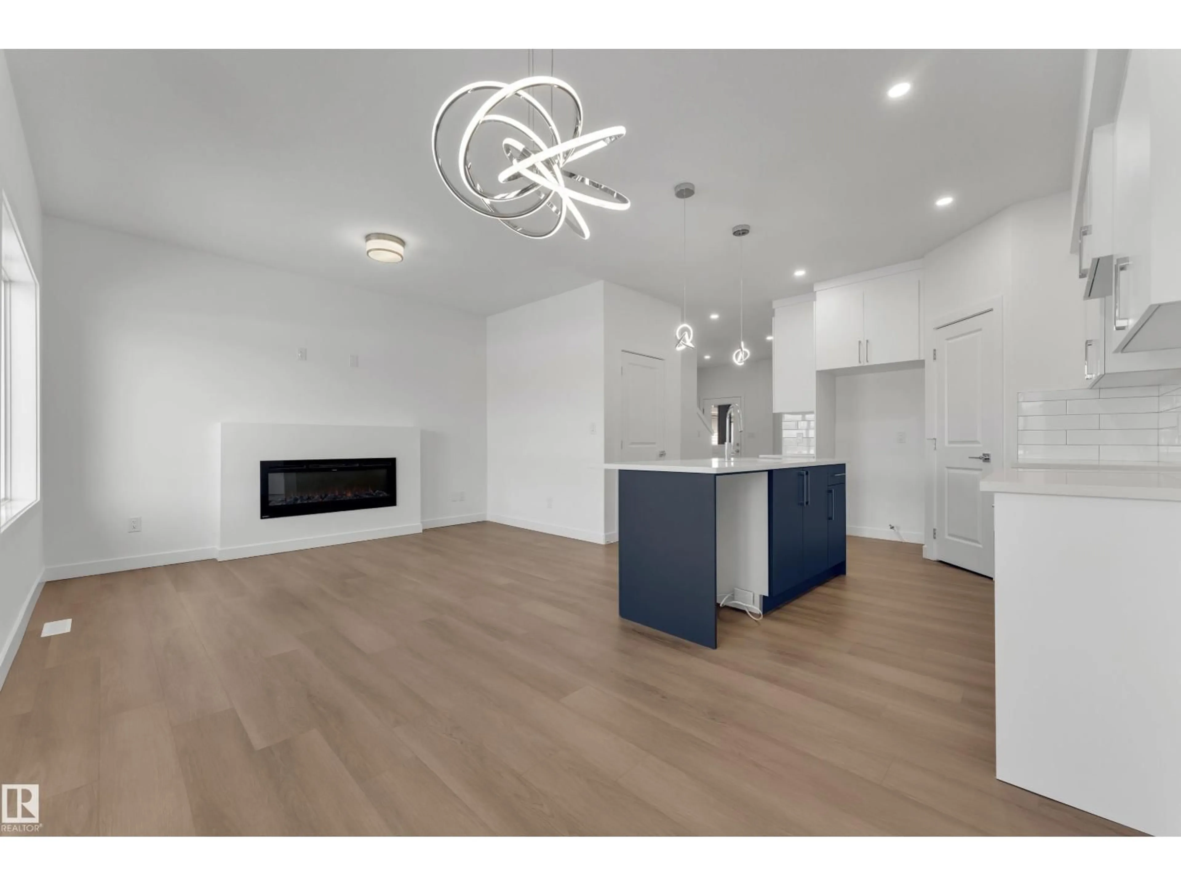 Open concept kitchen, wood/laminate floor for 114 MITCHELL BN, Leduc Alberta T9E1T4