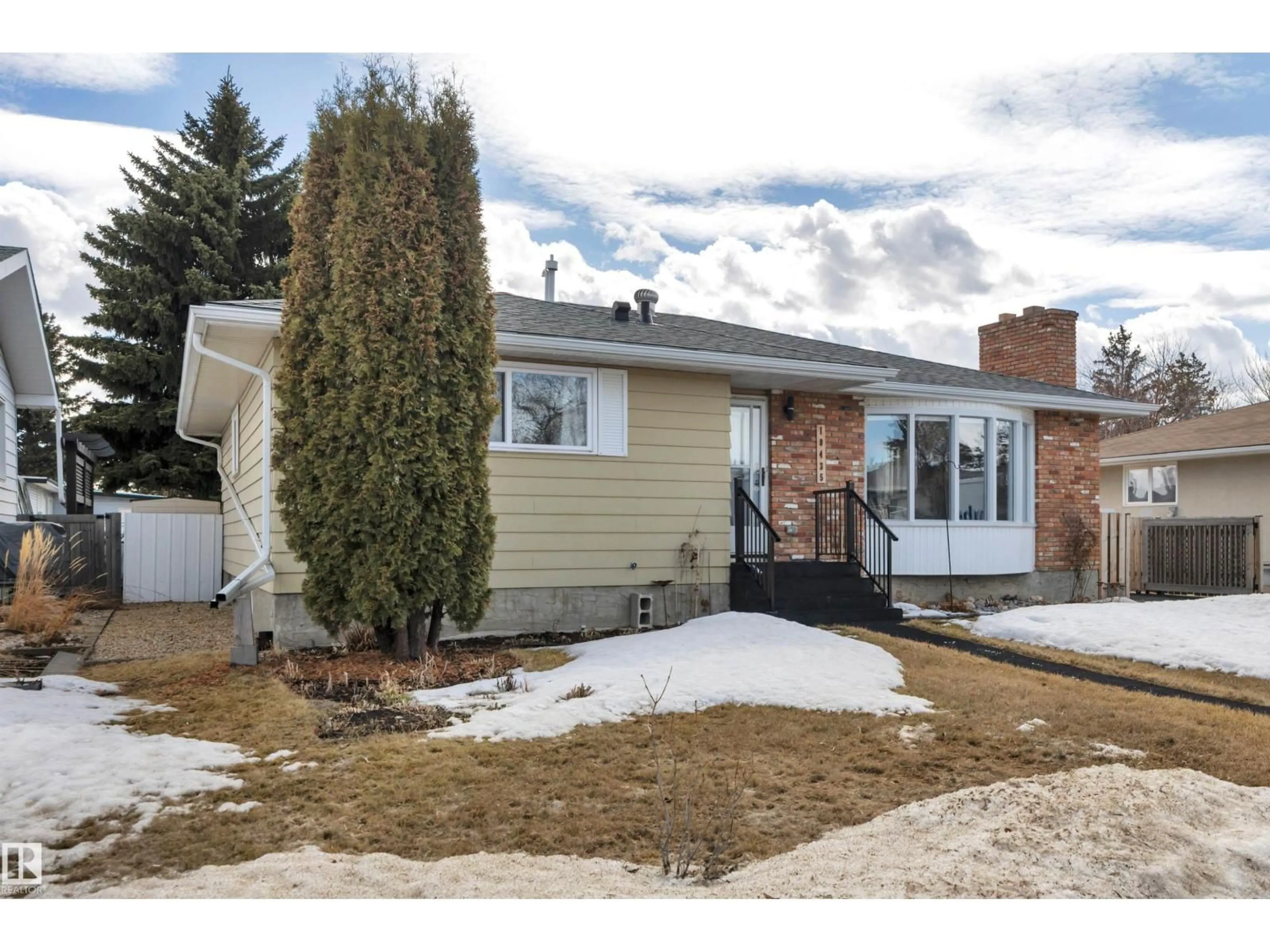 Home with vinyl exterior material, street for 10435 39A AV, Edmonton Alberta T6J2J5