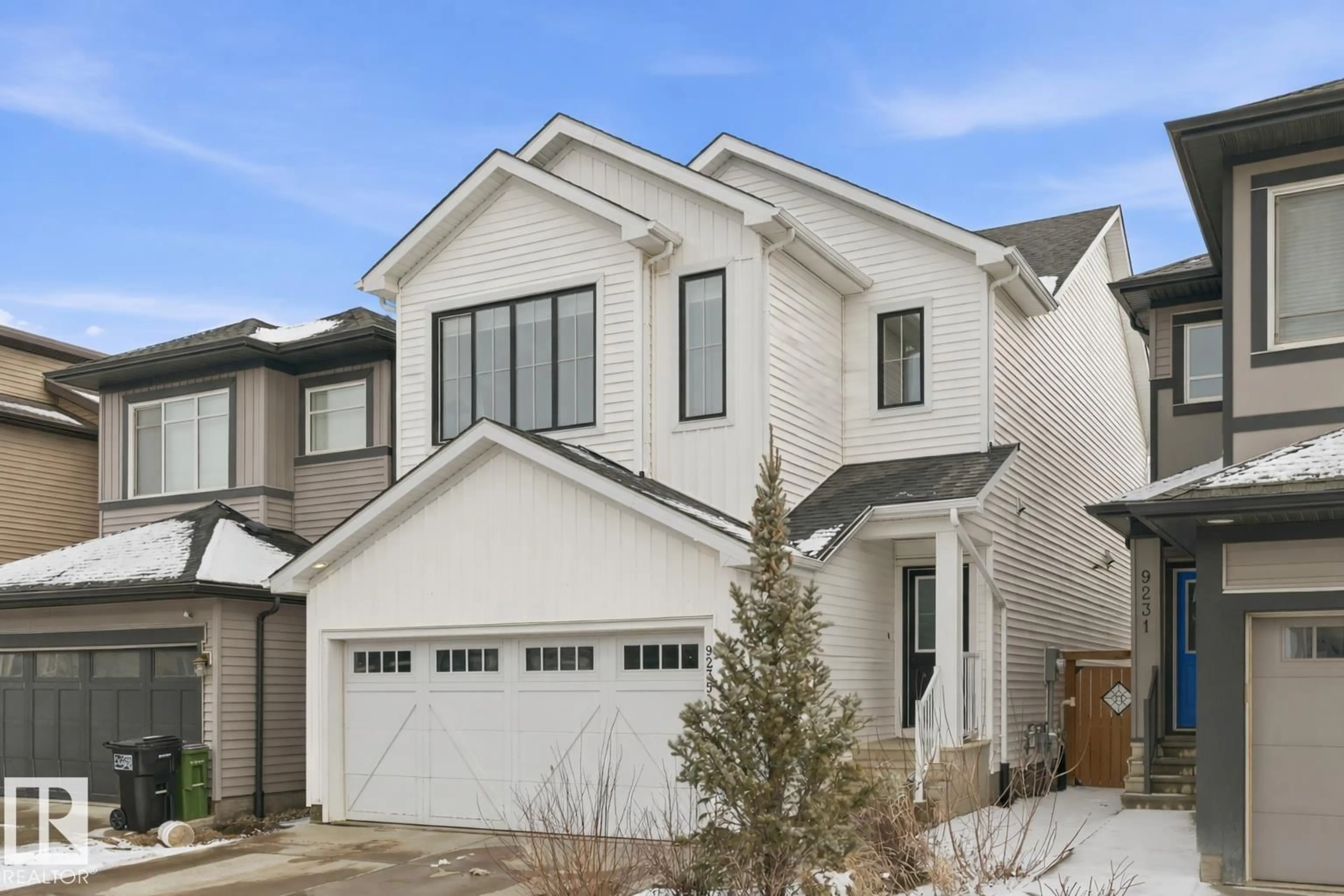 Home with vinyl exterior material, street for NW - 9235 223 ST, Edmonton Alberta T5T7M1