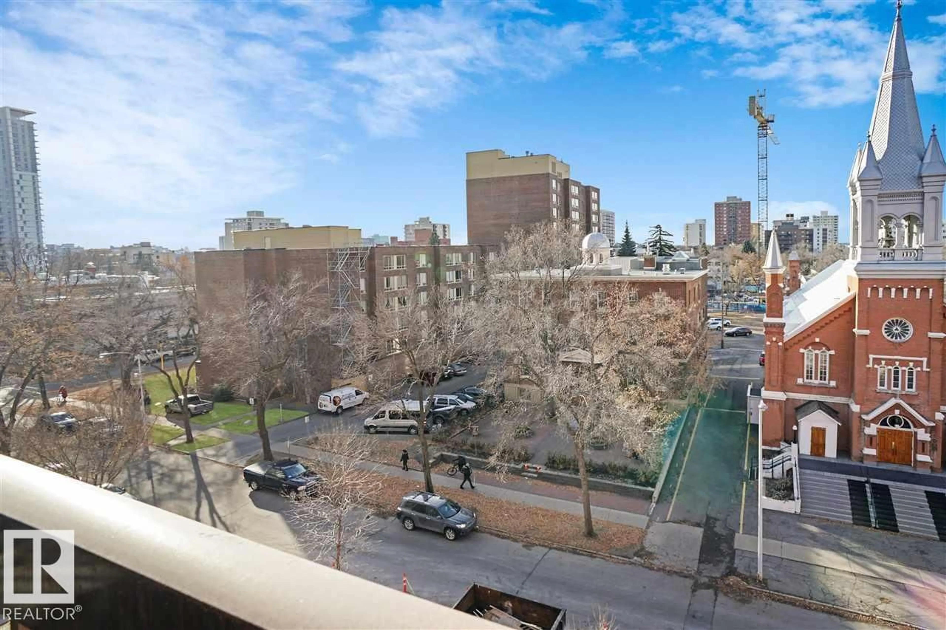 Patio, city buildings view from balcony for #604 - 9917 110 ST, Edmonton Alberta T5K2N4