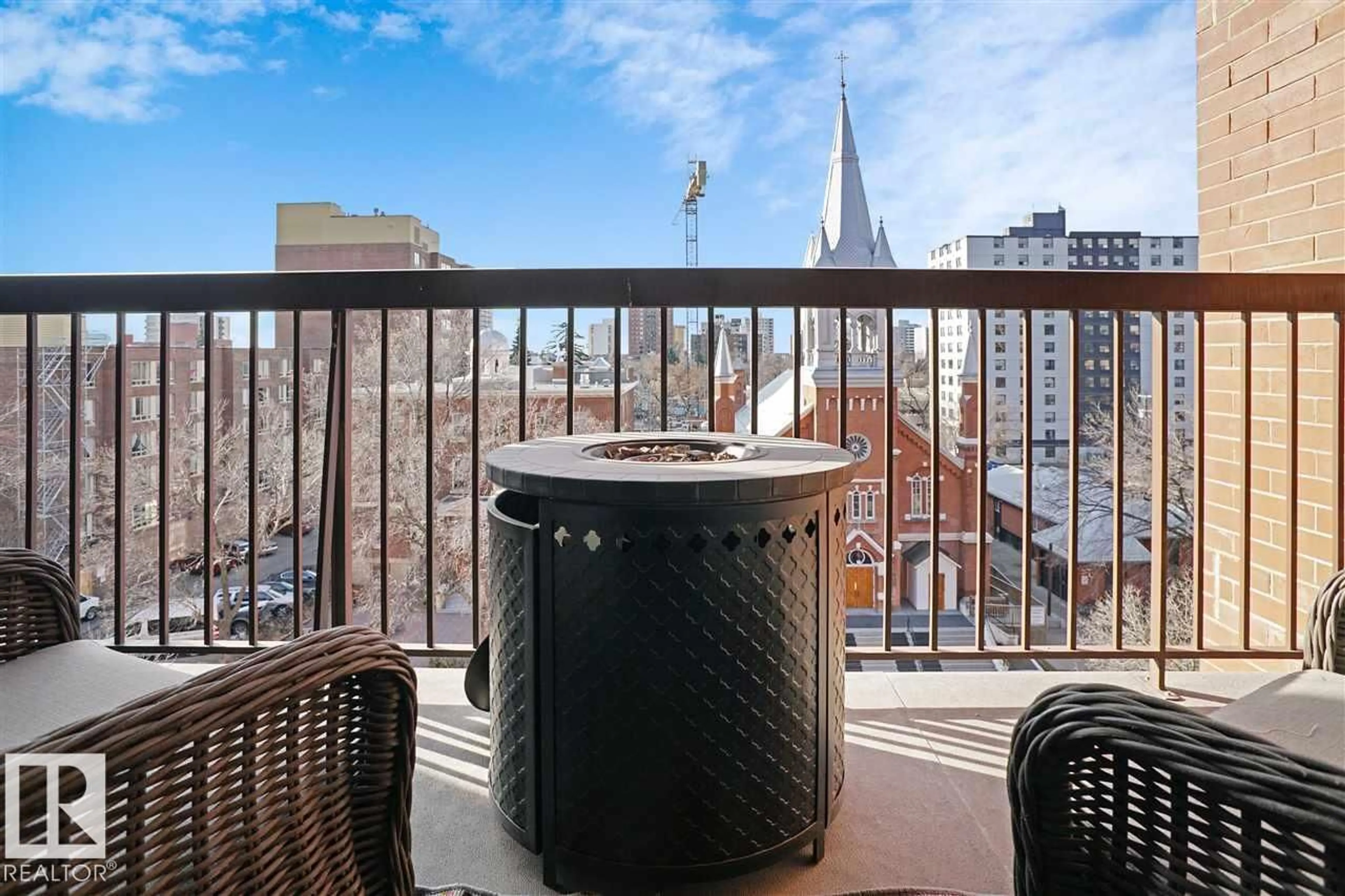 Patio, city buildings view from balcony for #604 - 9917 110 ST, Edmonton Alberta T5K2N4