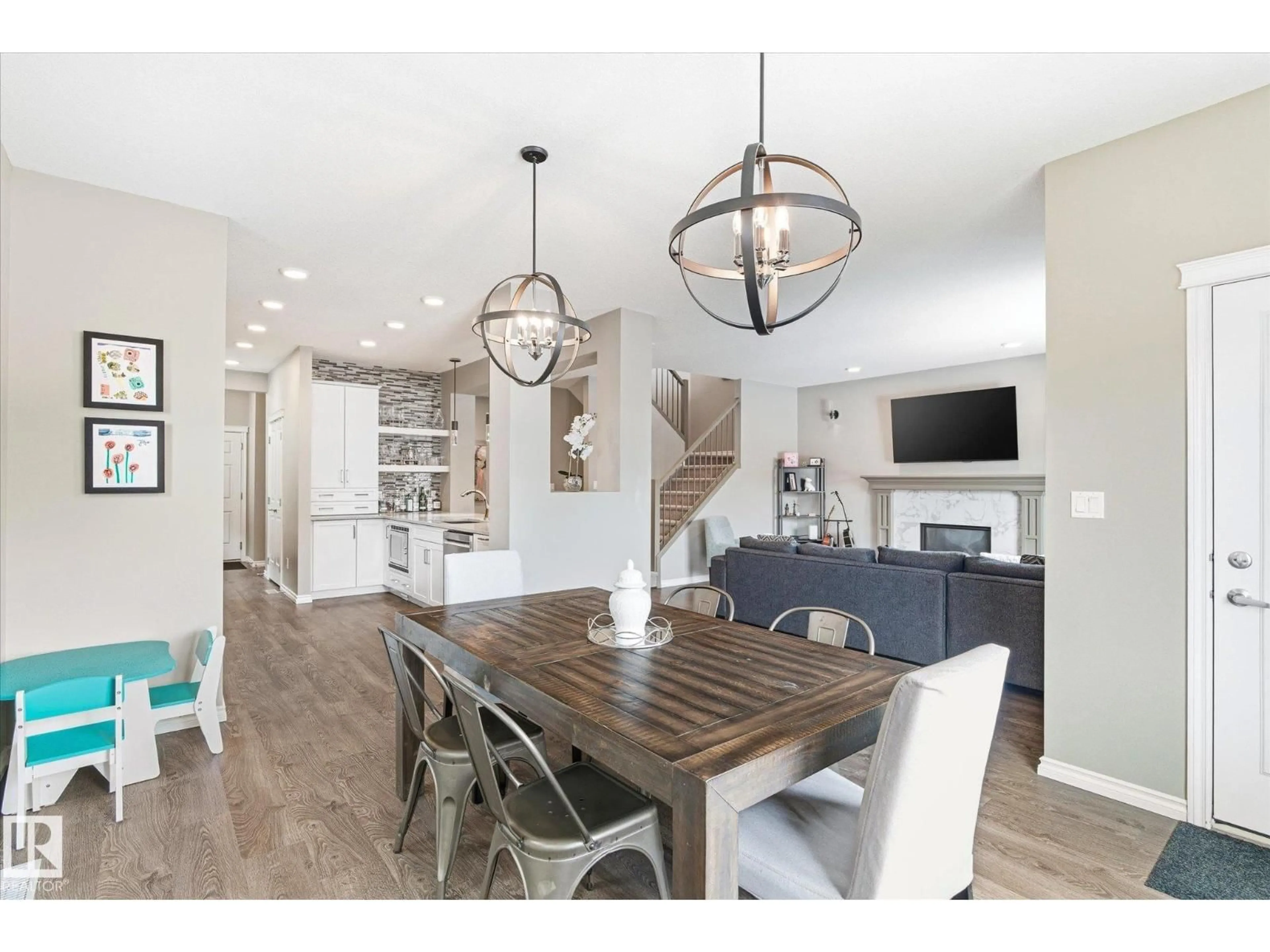 Open concept kitchen, wood/laminate floor for NW - 13012 207 ST, Edmonton Alberta T5S0K1