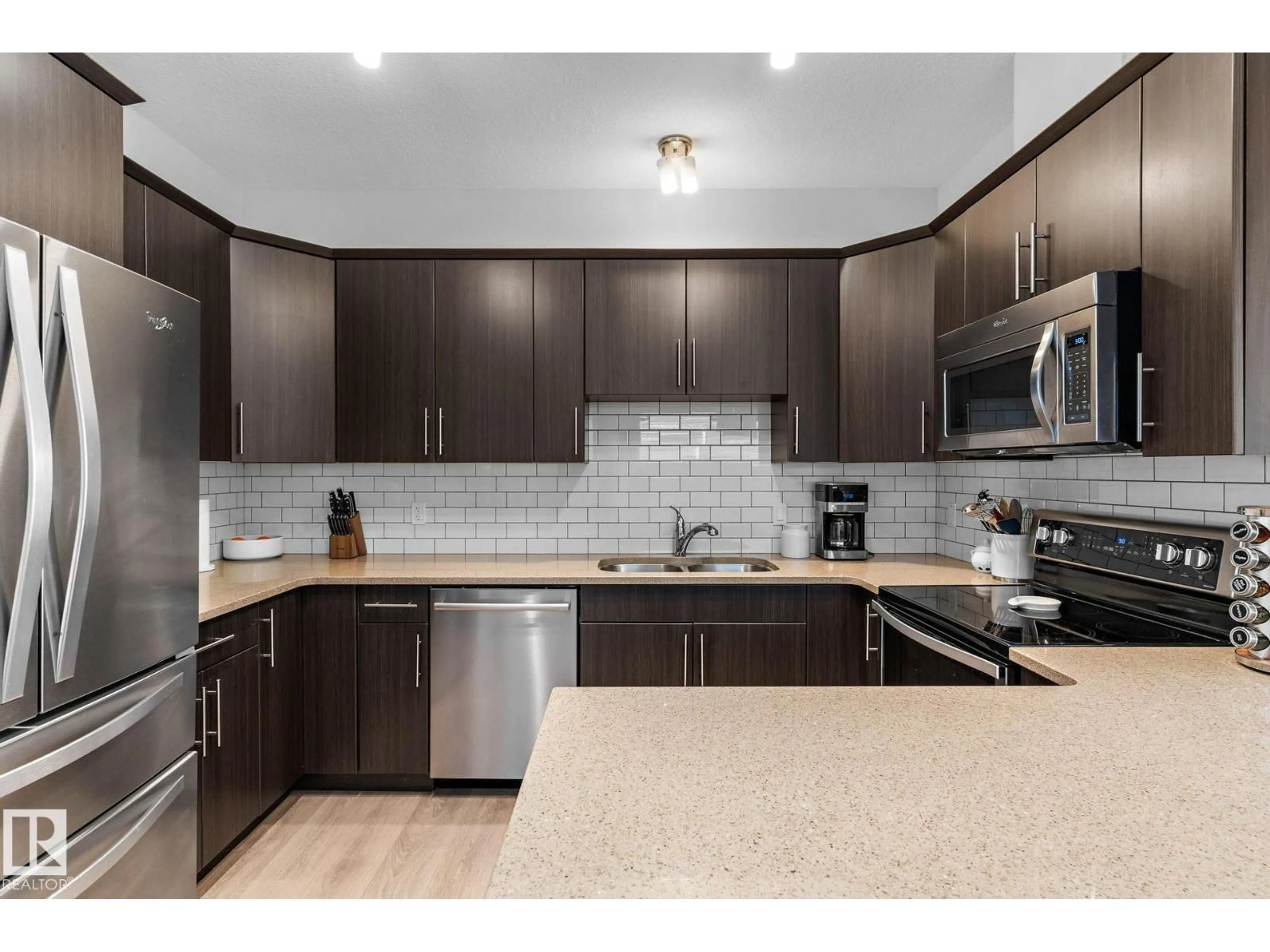 Open concept kitchen, ceramic/tile floor for 76 ABBEY RD, Sherwood Park Alberta T8H0Z1
