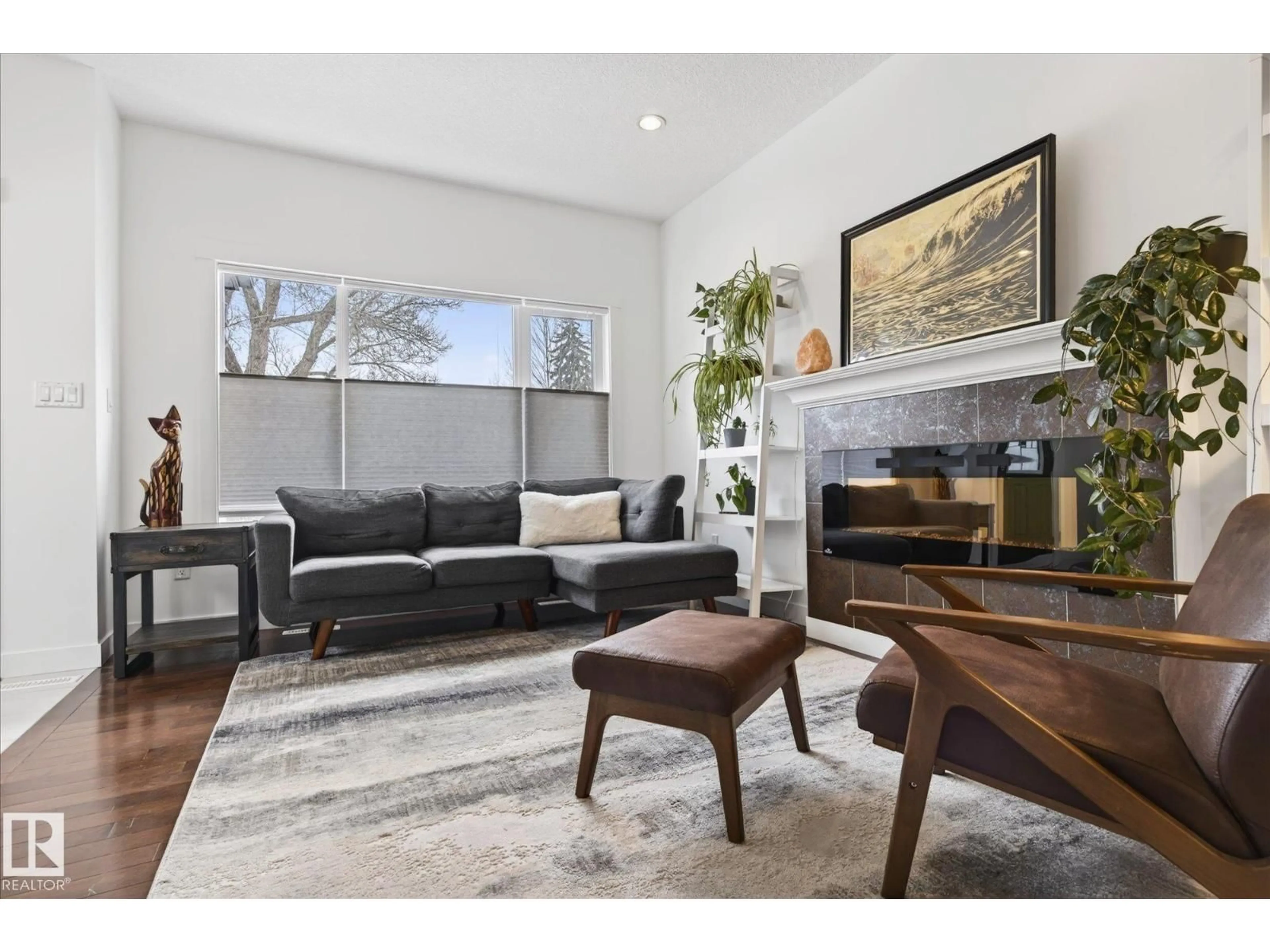 Living room with furniture, unknown for 9844 80 AV, Edmonton Alberta T6E1T1