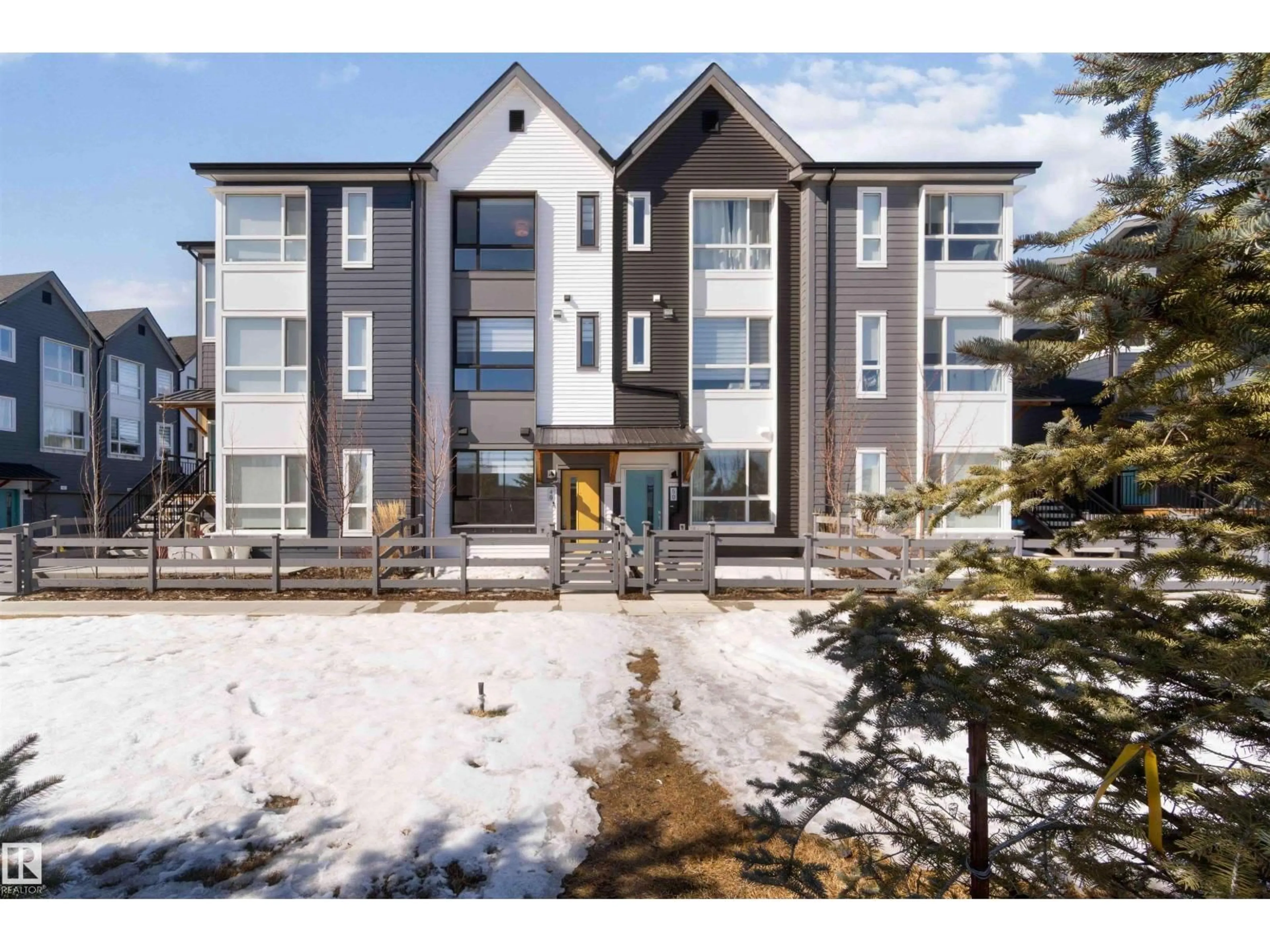 A pic from outside/outdoor area/front of a property/back of a property/a pic from drone, unknown for 100 - 49 JENSEN LAKES BV, St. Albert Alberta T8N7T9