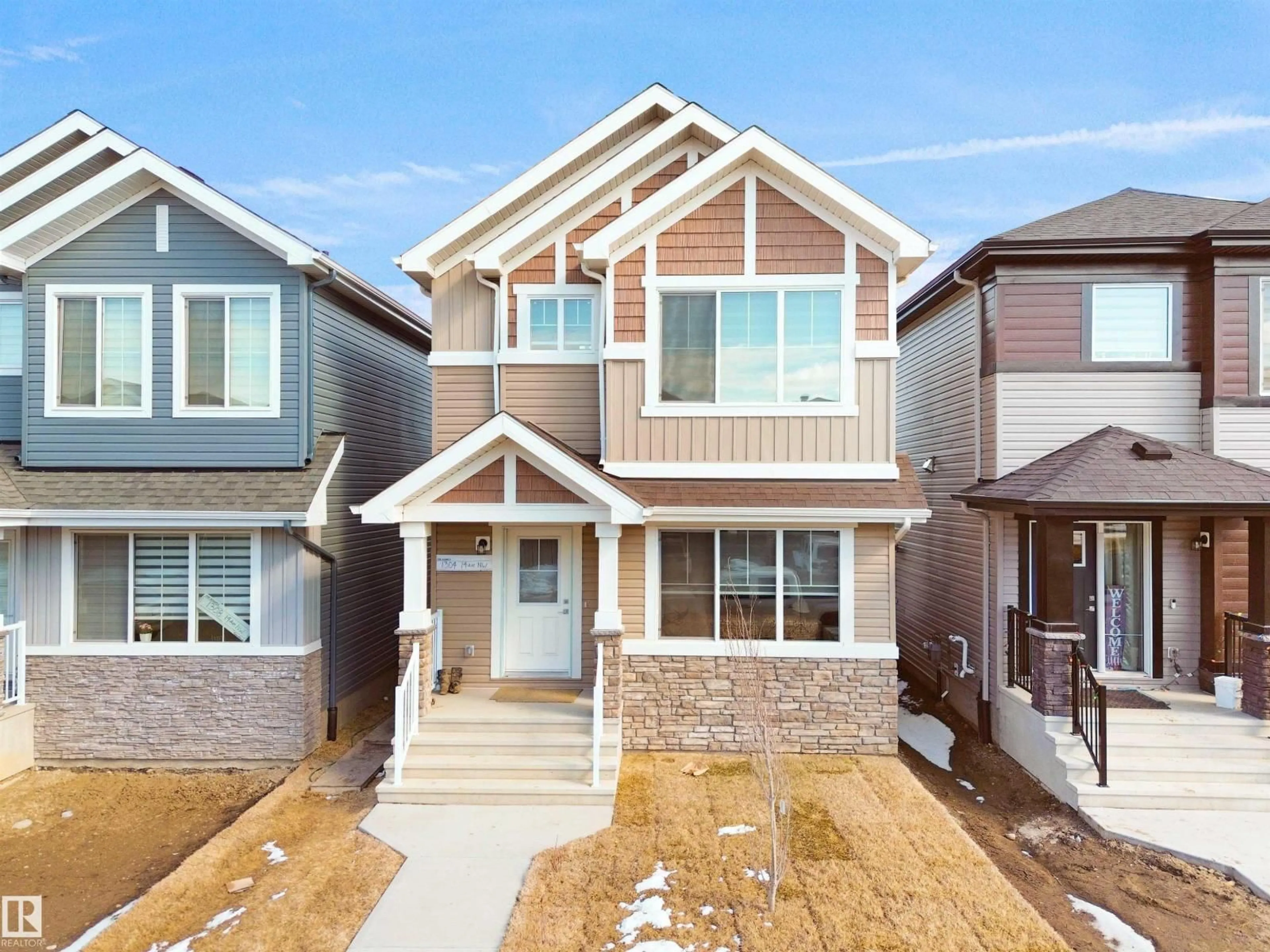 Home with brick exterior material, street for NW - 1304 14 AV, Edmonton Alberta T6T2T9