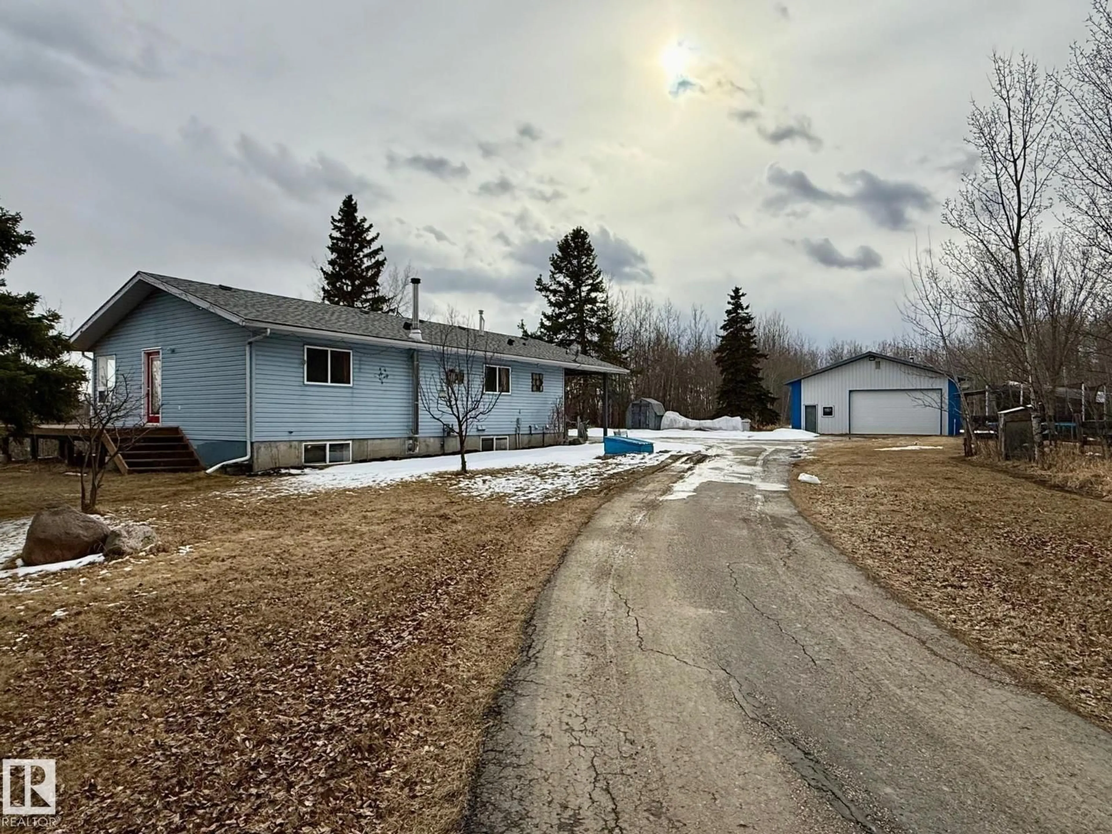 A pic from outside/outdoor area/front of a property/back of a property/a pic from drone, street for 48052 RANGE ROAD 273, Rural Leduc County Alberta T0C0V0
