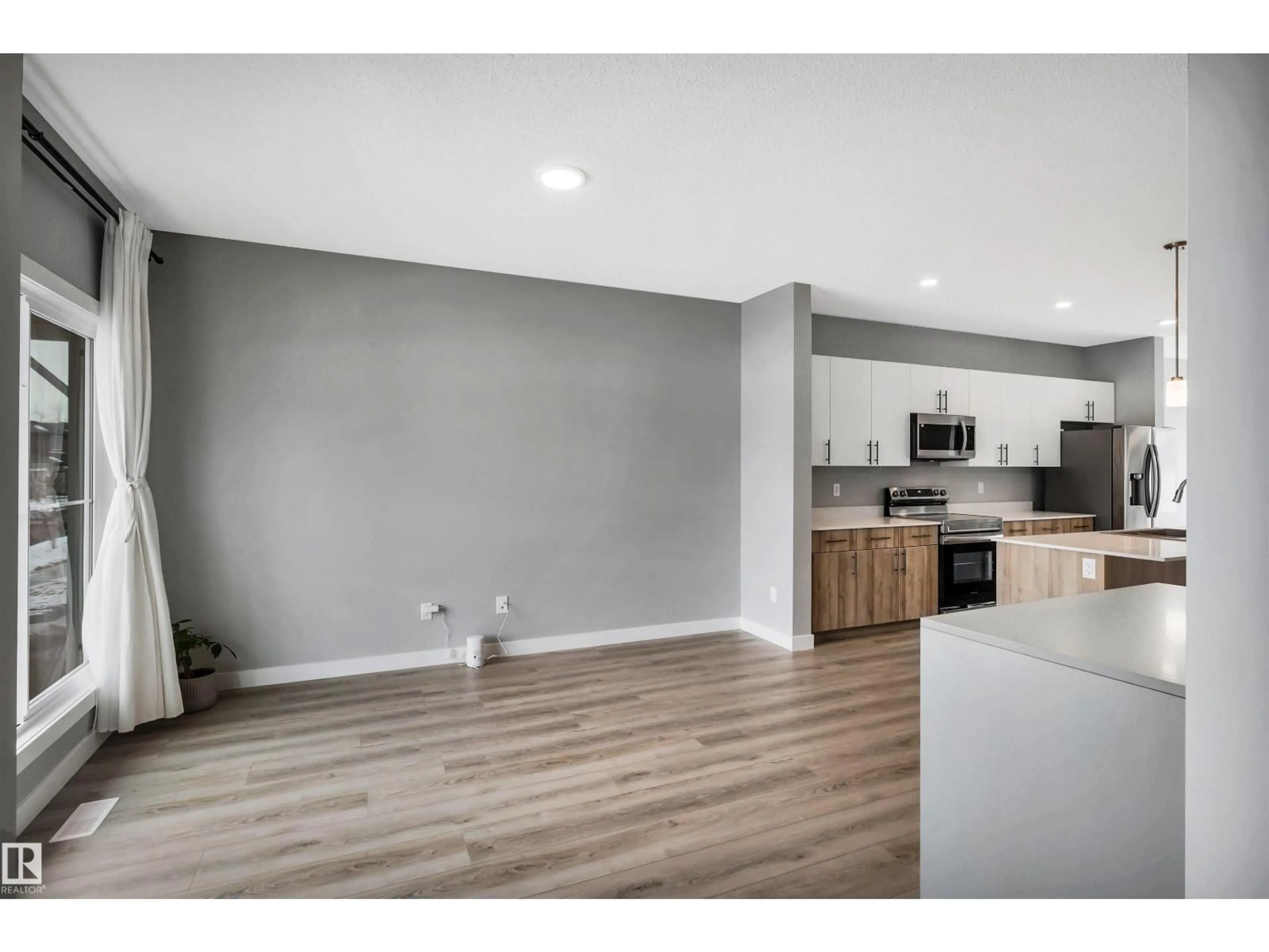 Open concept kitchen, unknown for 6256 175 AV, Edmonton Alberta T5Y4H3