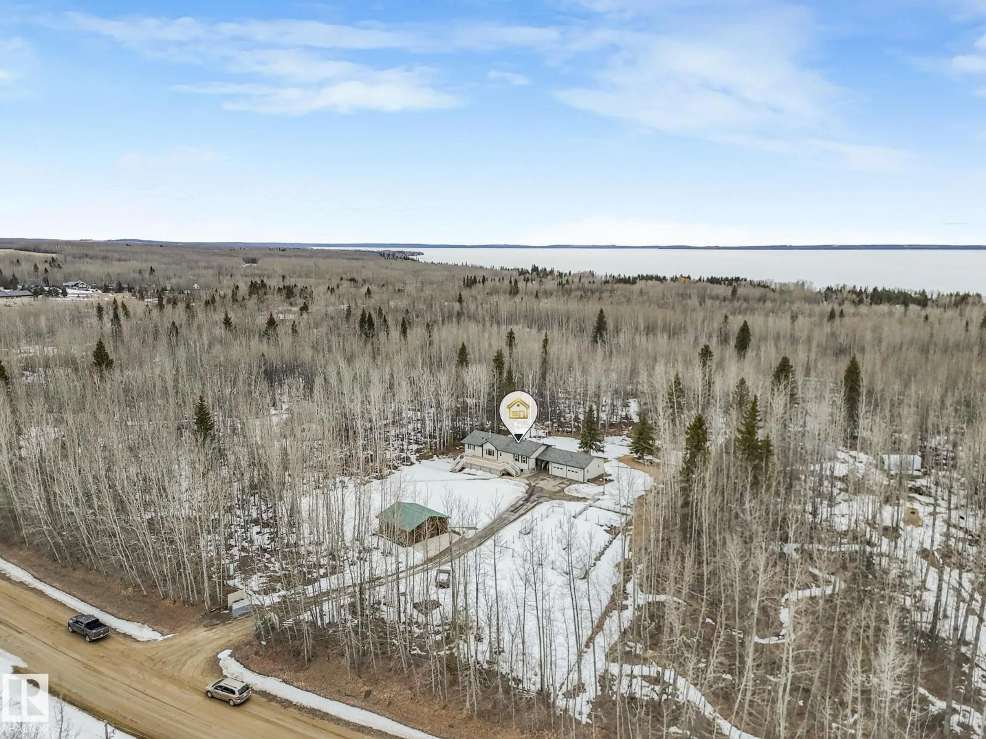 A pic from outside/outdoor area/front of a property/back of a property/a pic from drone, water/lake/river/ocean view for 636 462014 RGE ROAD 10, Rural Wetaskiwin County Alberta T0C2V0