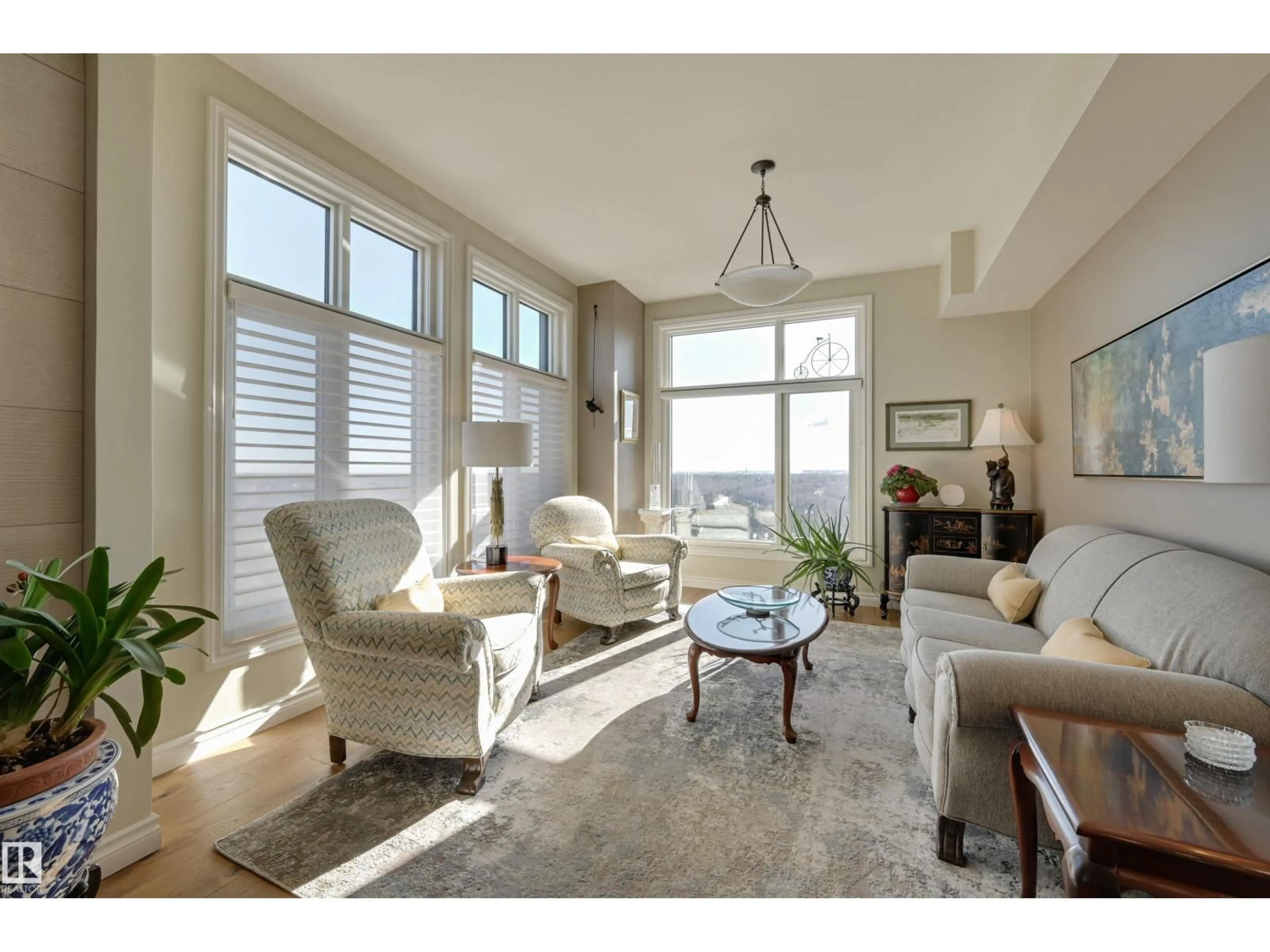 Living room with furniture, unknown for #1003 - 9020 JASPER AV, Edmonton Alberta T5H3S8