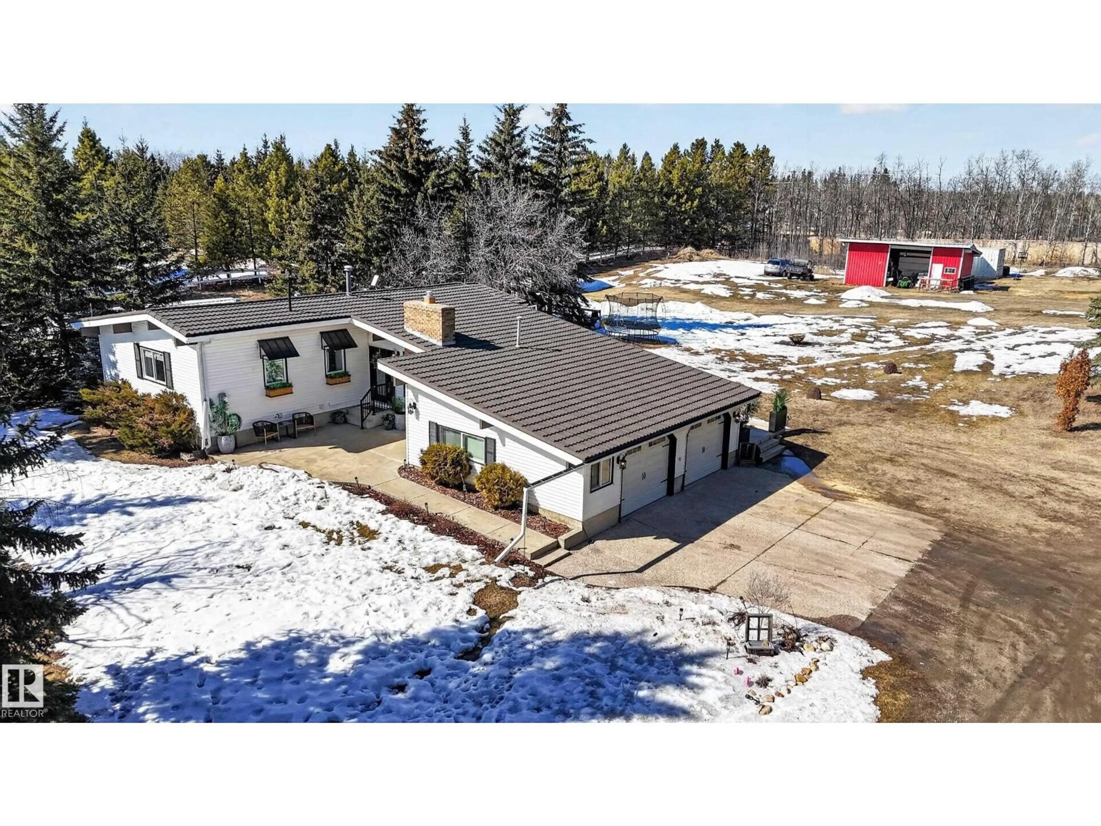 A pic from outside/outdoor area/front of a property/back of a property/a pic from drone, building for 18 26503 TWP ROAD 511, Rural Parkland County Alberta T7Y1G4